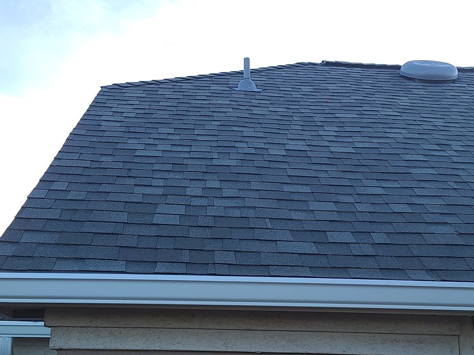 Hail Damage Restoration for Austin Two-Story Residential Home by Caliber Restoration LLC
