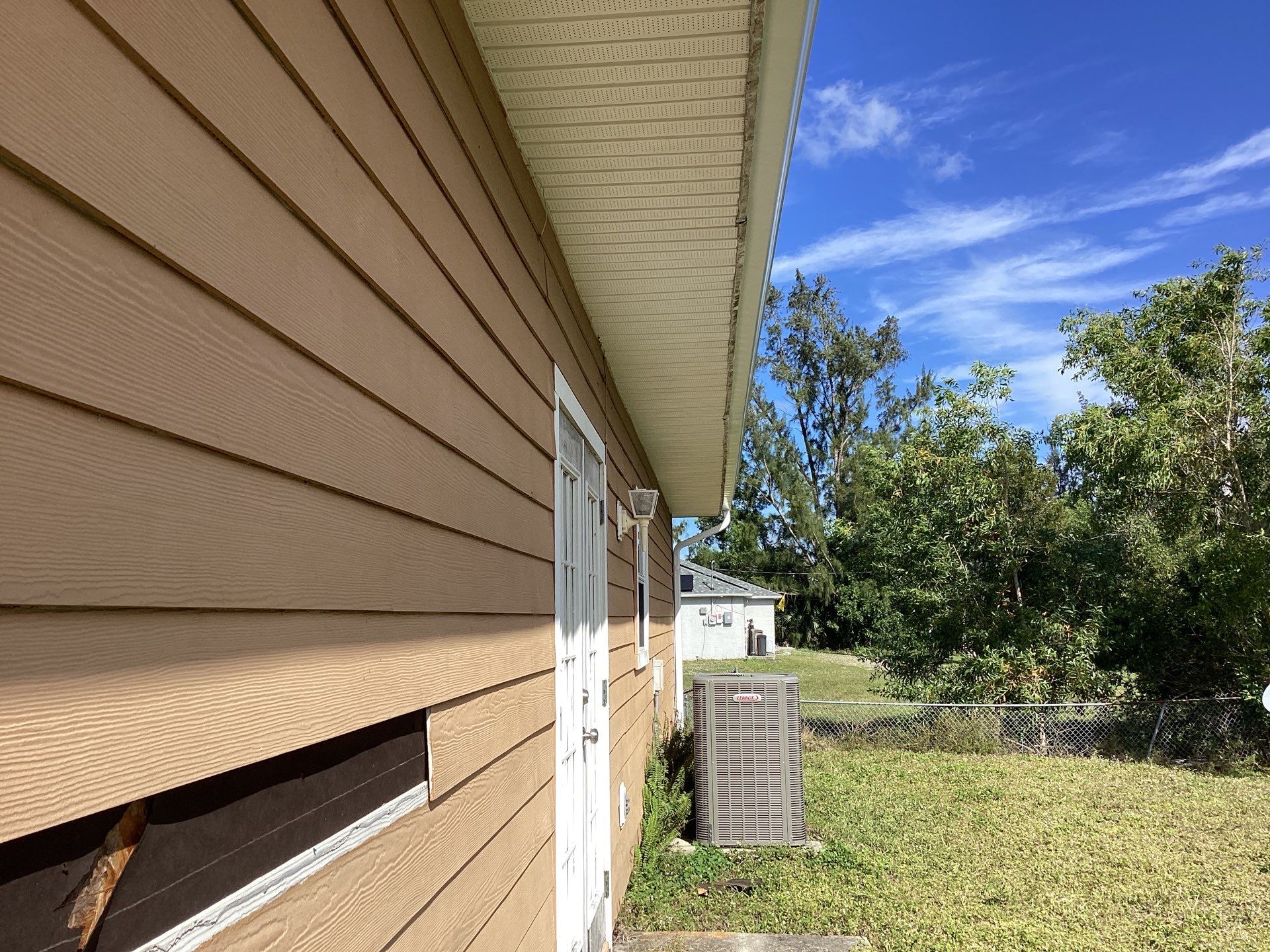 Soffit & Fascia White + New Downspouts by Gutter Professors