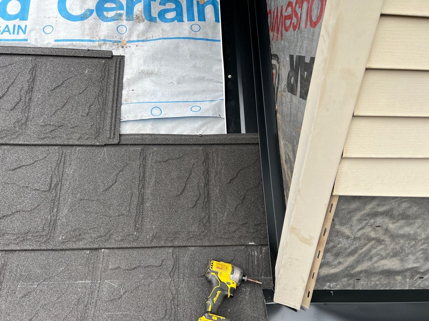 Residential Roofing Repair using Metstar Stone Coated Charcoal by Nitro Roofing and Construction