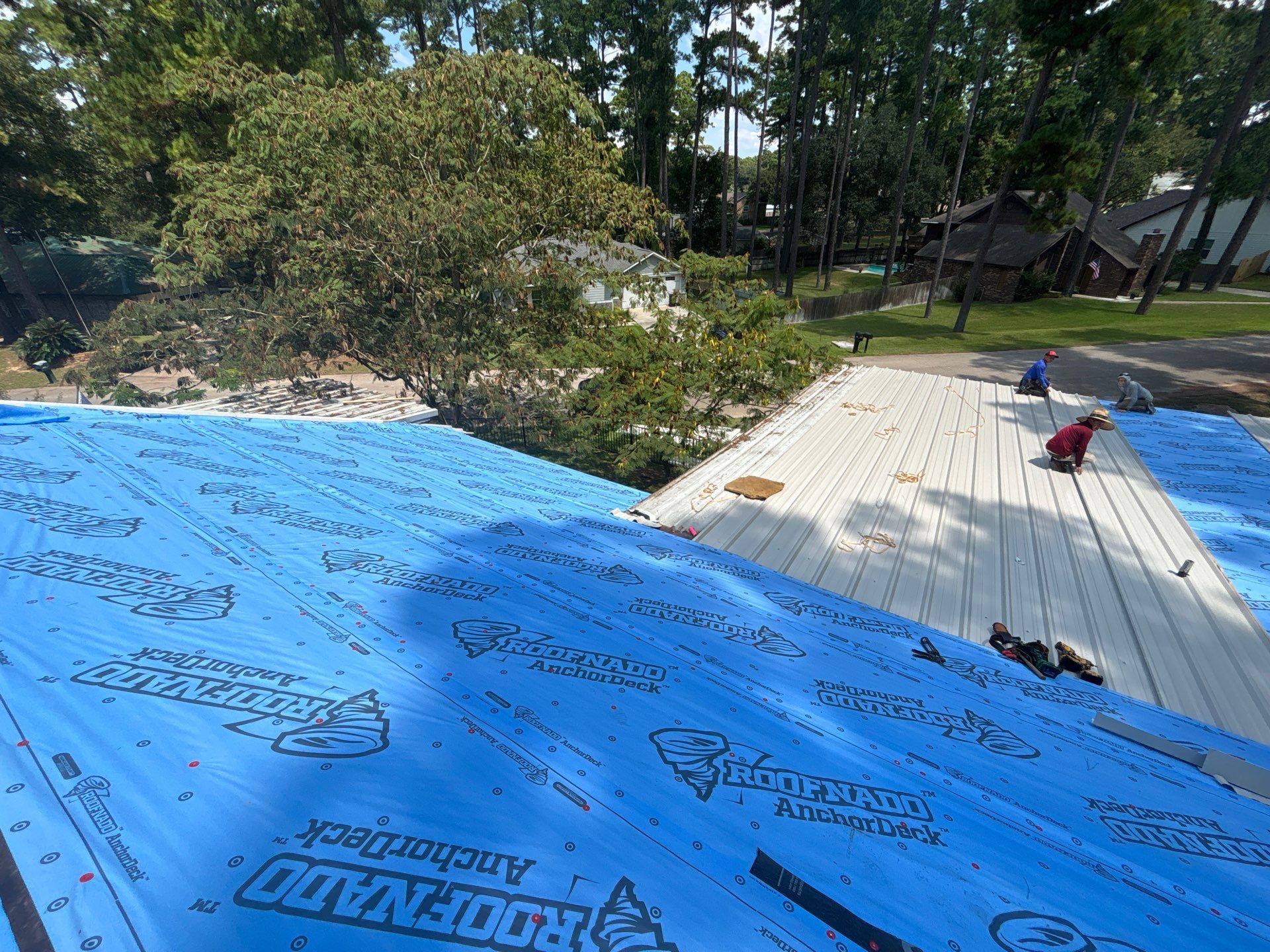 White Standing Seam Metal Roof Replacement in Willis, Texas by Abbott Roofing Company