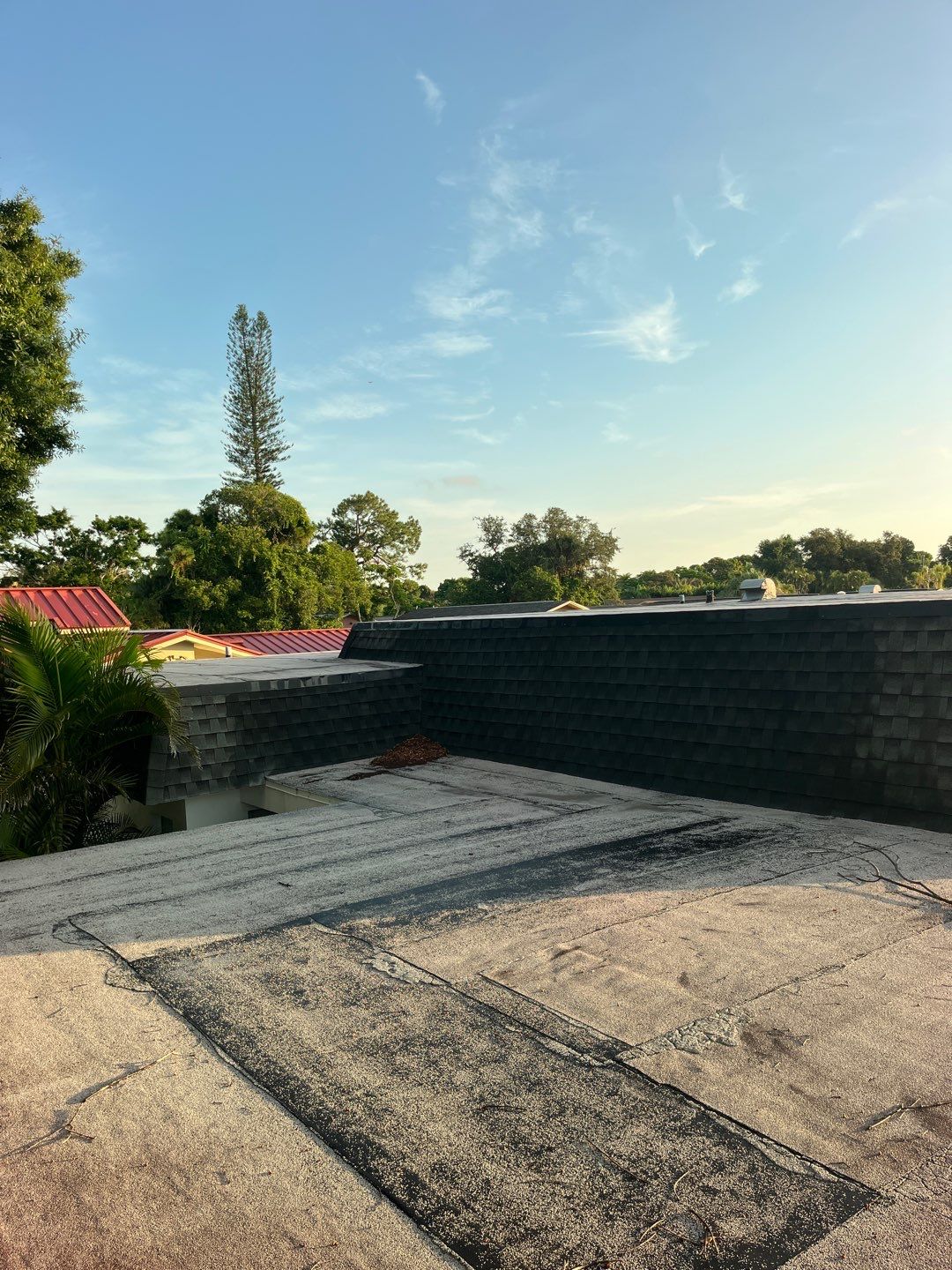 Residential Roofing Installation using TPO Roofing System & Tuff Rib Metal  by Durabilis Roofing INC