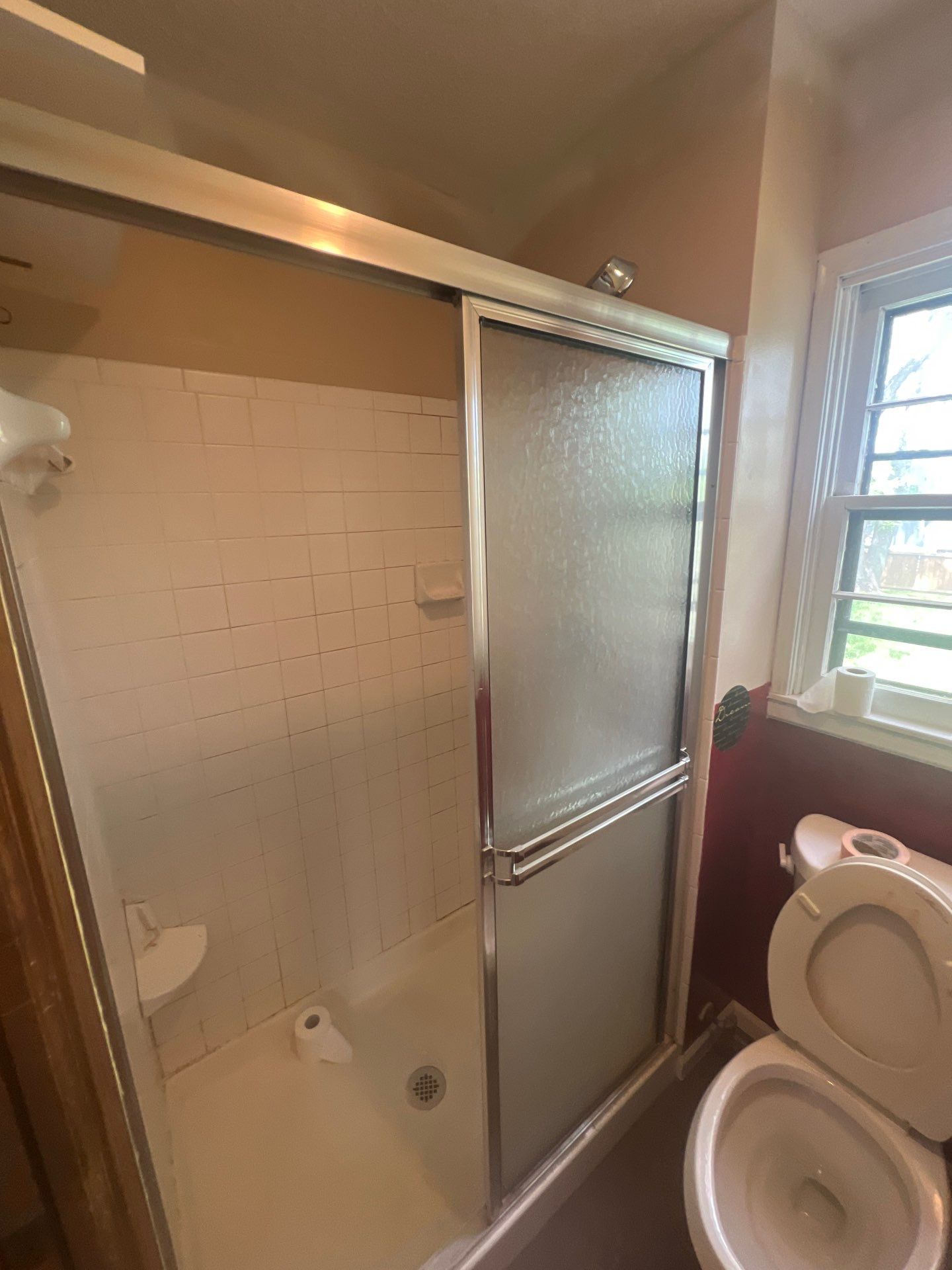 Bathroom Remodel using Tile Floor by The Shower Company