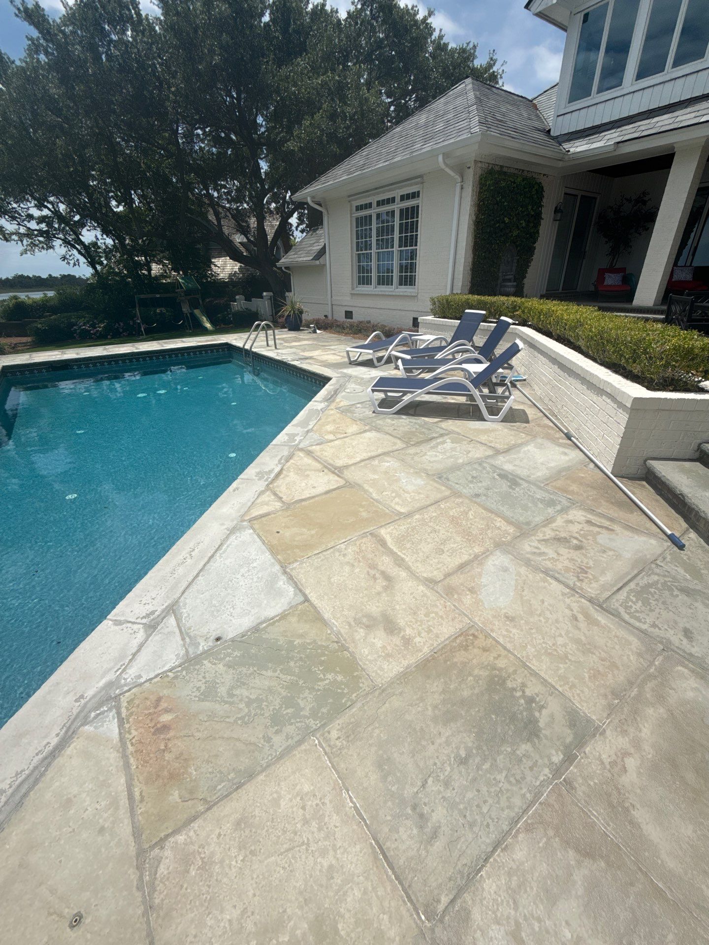 Pool deck cleaning in Wilmington by Shark Power Washing