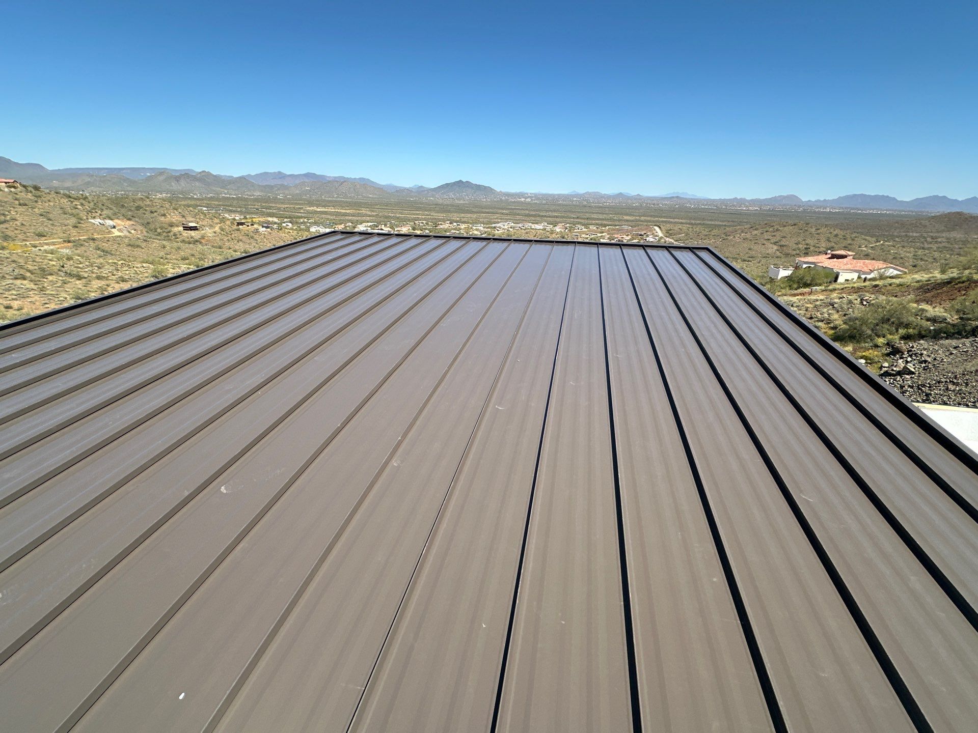 Dark Bronze Standing Seam by Reimagine Roofing