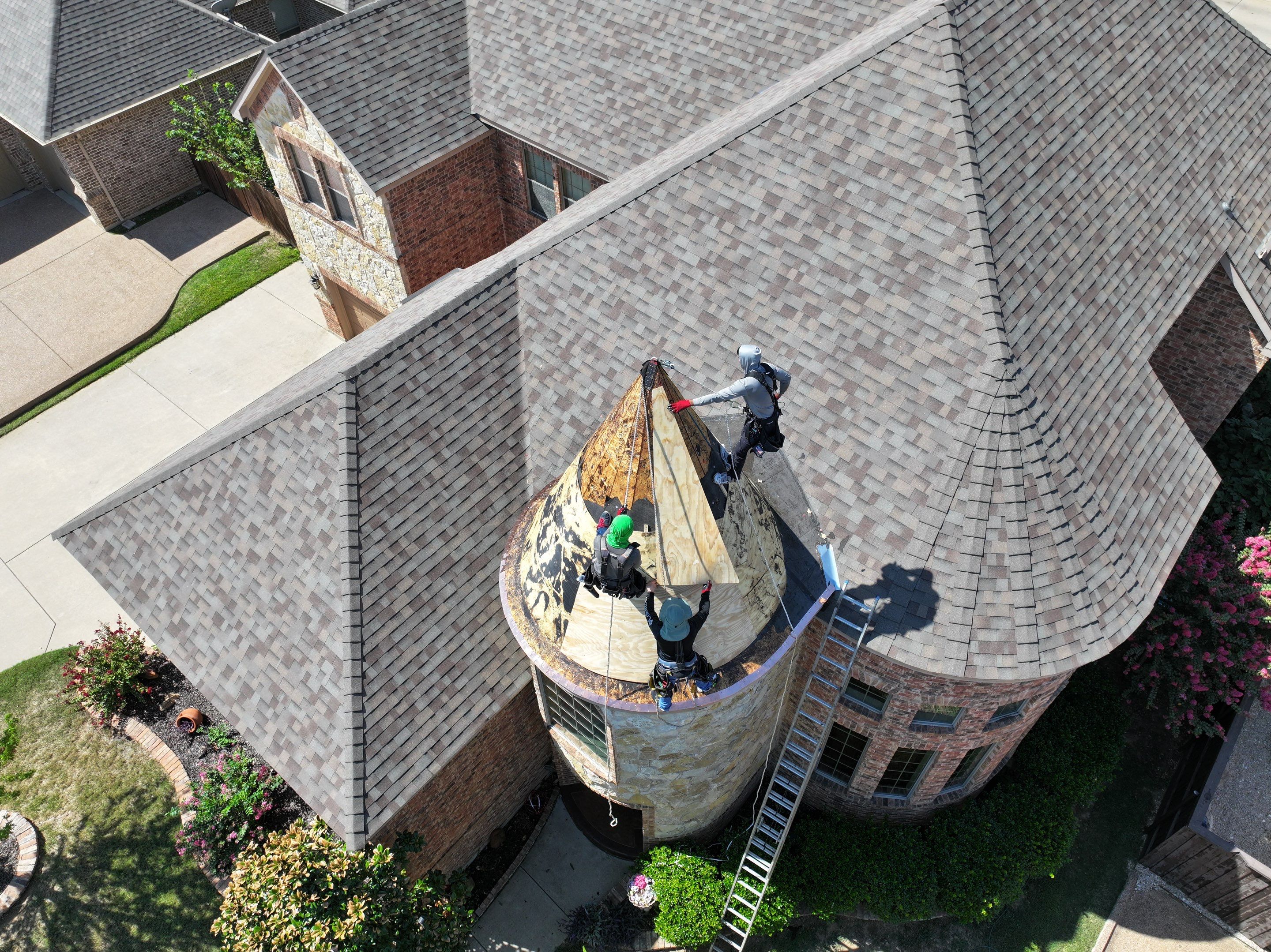 Installing Custom copper turret and Malarkey Vista Class 4 shingles Hail Damage Upgrade by Becker Roofing and Exteriors