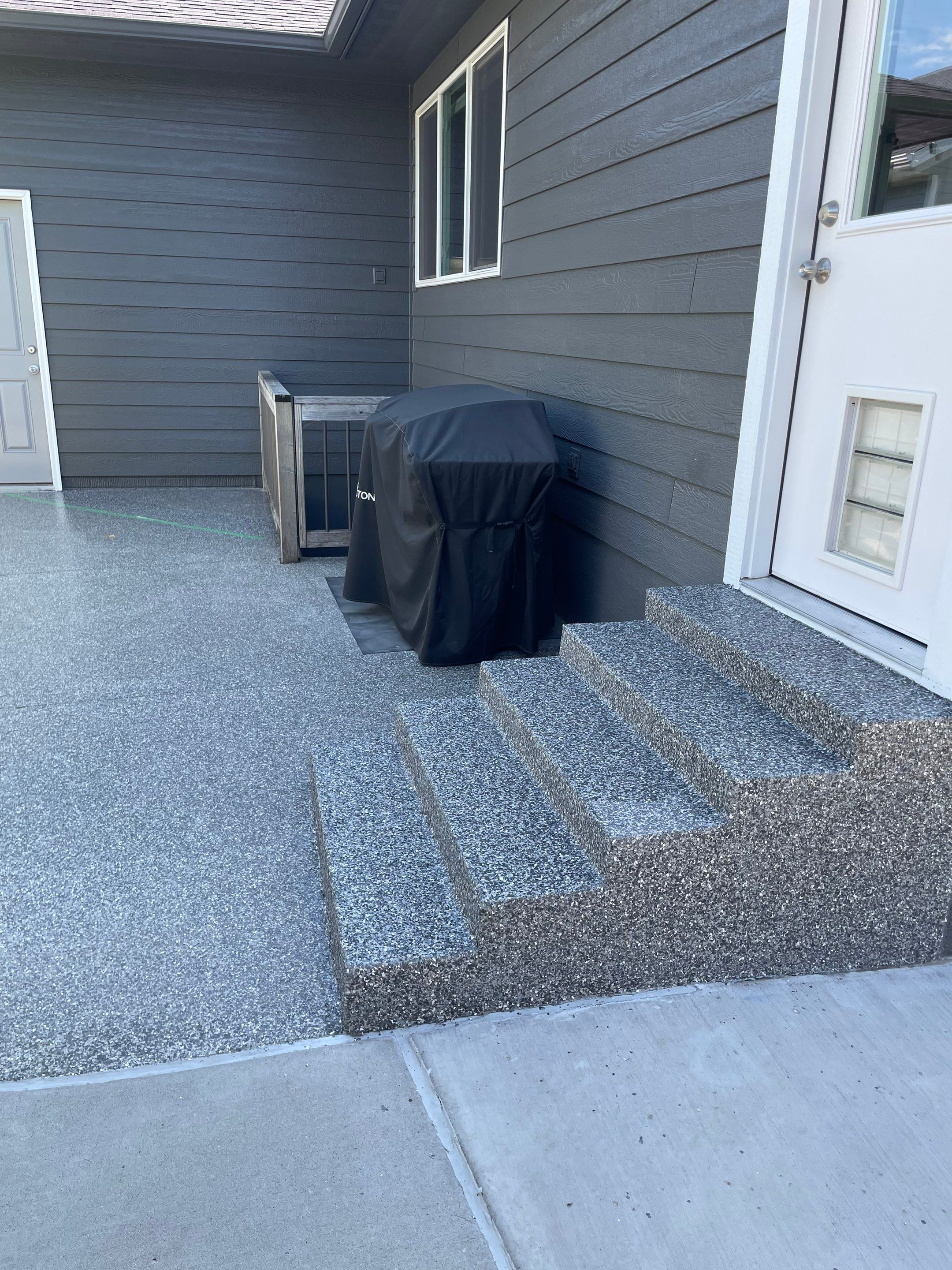 Silver Creek Flak Coating for Patio and Entry Steps in Sioux Falls by Select Painting, Coatings & Garage Cabinets