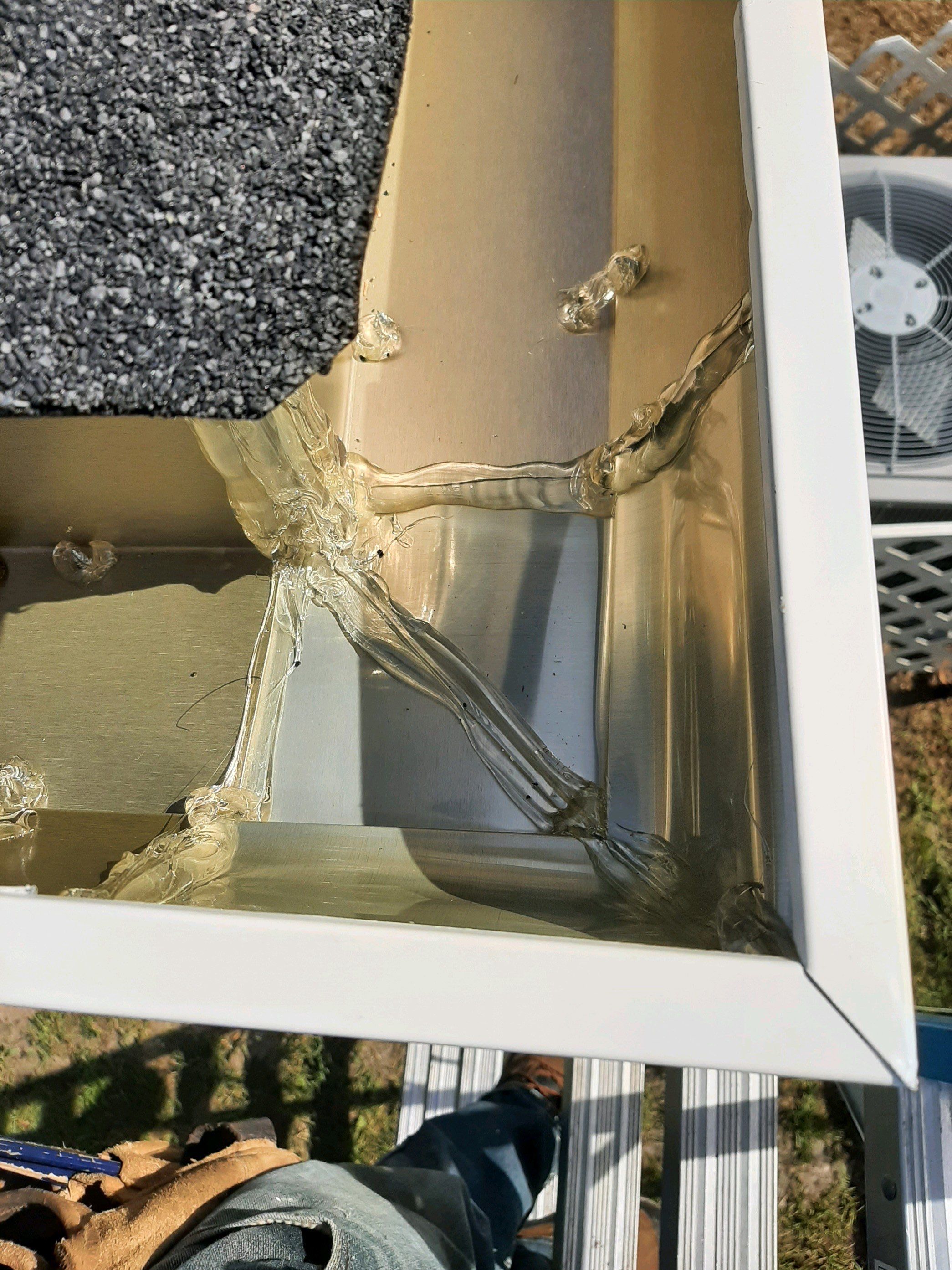Seamless Gutter Installation using White K-Style Gutters by Gutter Professors