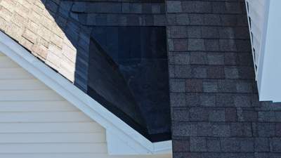 Roof-to-Wall Leak Repair – EPDM Conversion & Drainage Fix