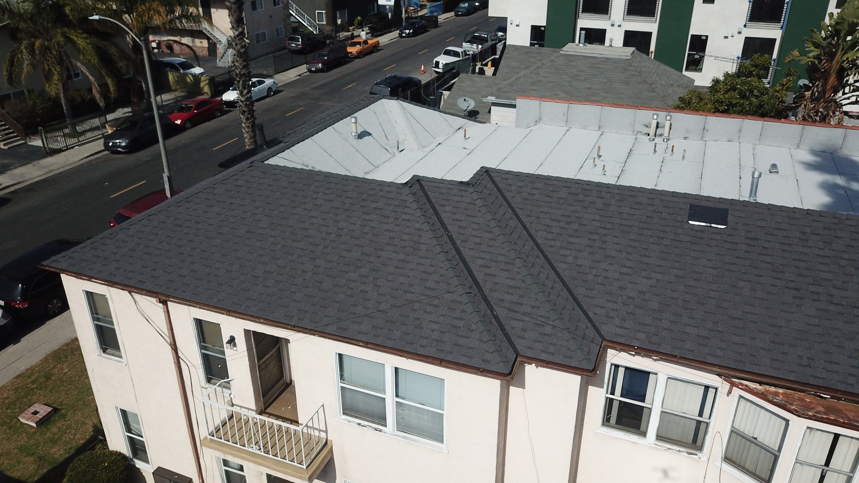Apartment Building Roofing Installation using CertainTeed GTA Modified Bitument System by Hull Brothers Roofing
