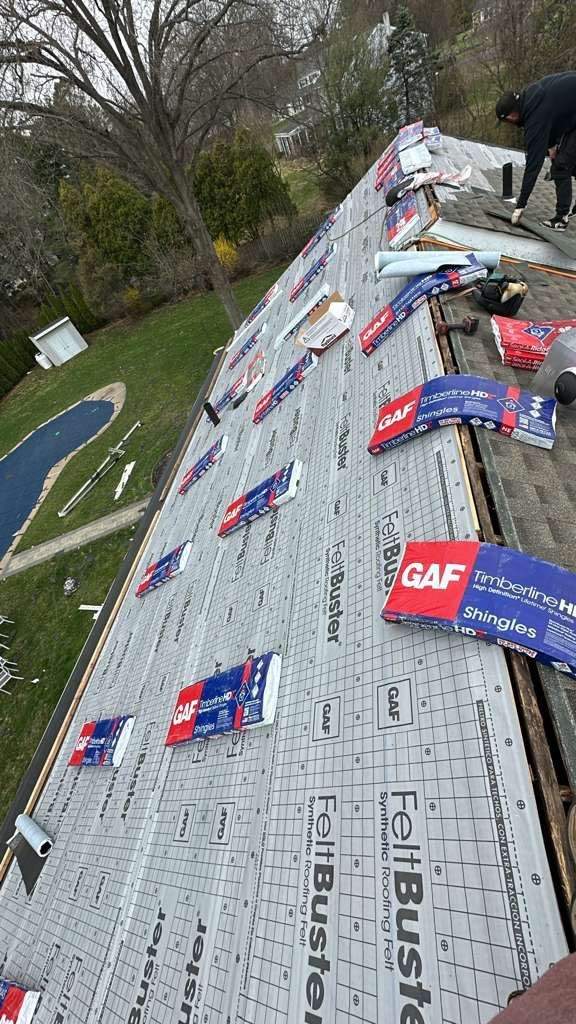 Roofing and Gutters  by Stofan Construction LLC