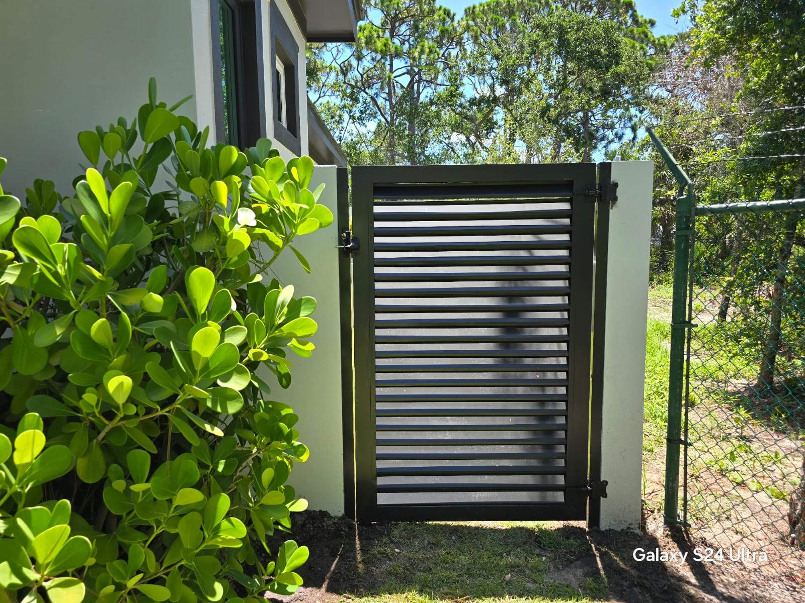 Louvered Aluminum Gates in Osprey by True Fence LLC