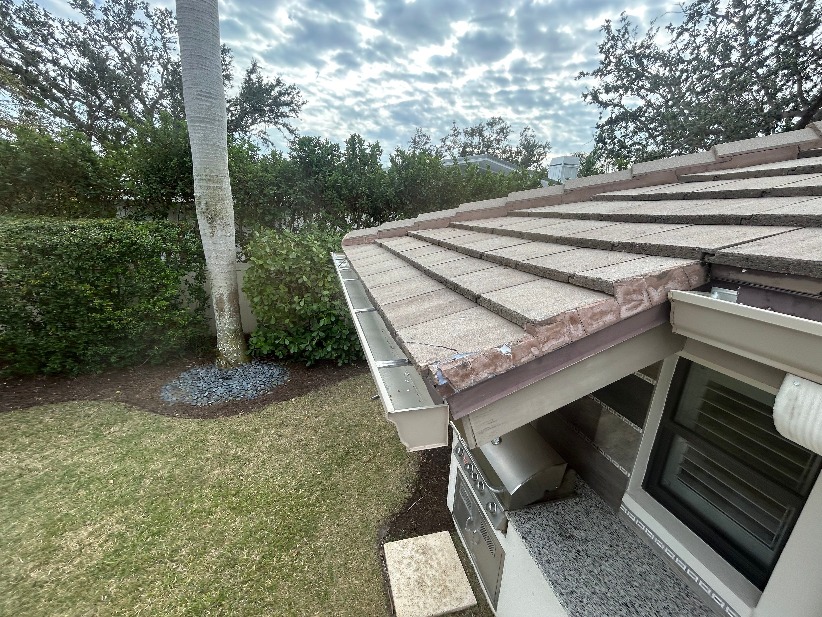 6-Inch White Seamless Gutters in Sarasota FL by Gutter Professors