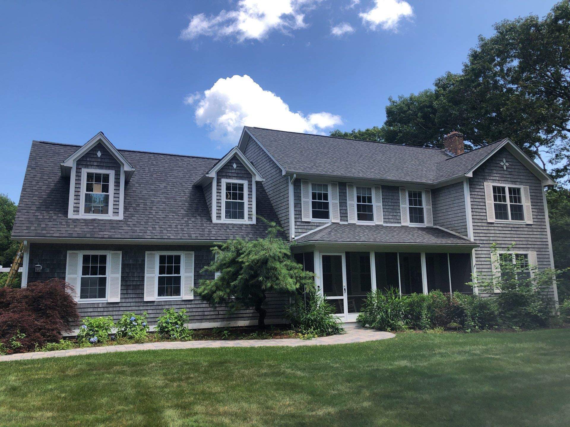 Pewterwood Roofs by Pinnacle Roofing & Skylights