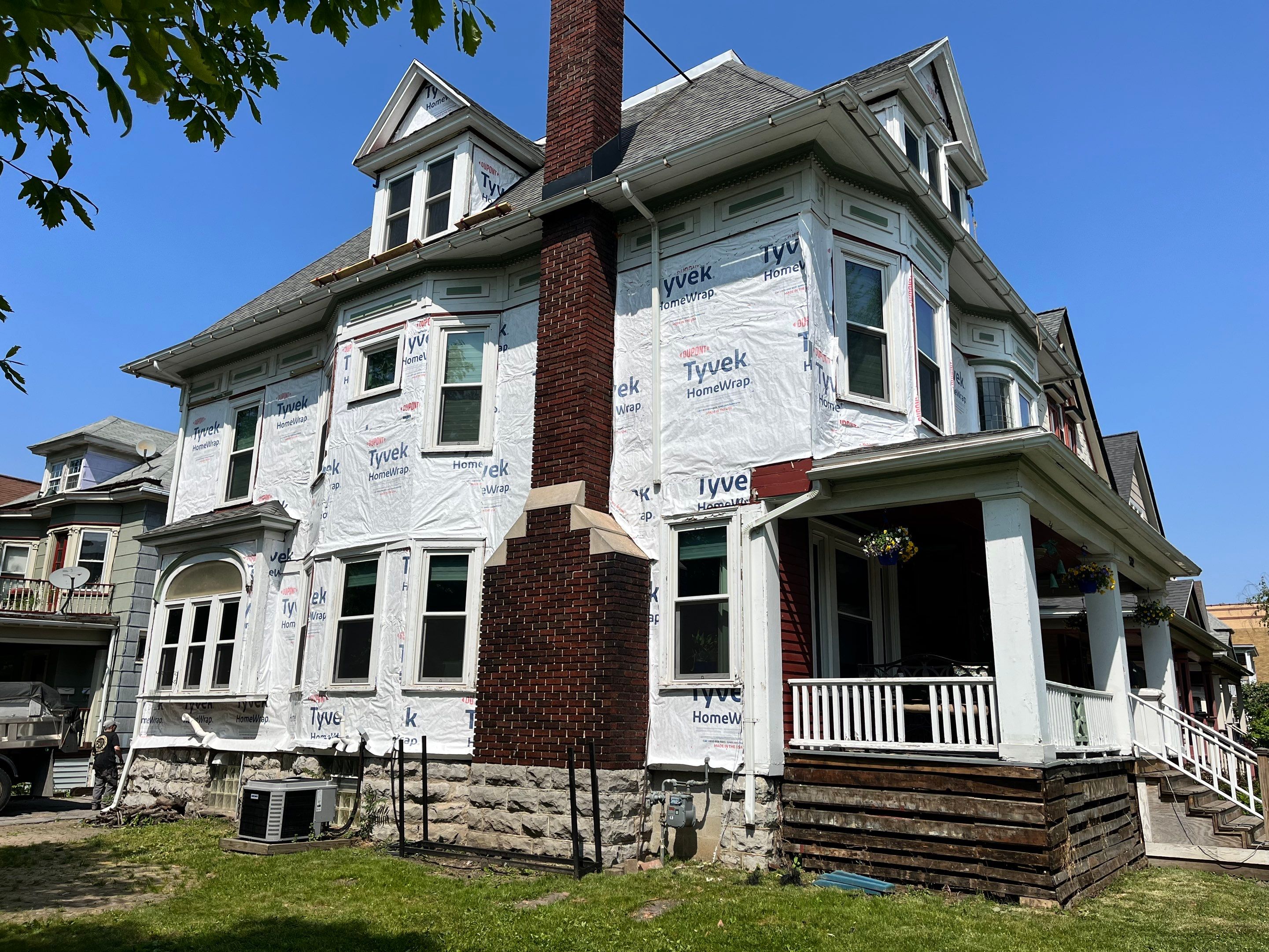 Exterior Renovations- Siding, Stamped Concrete, Porch, and Railings by Ivy Lea Construction