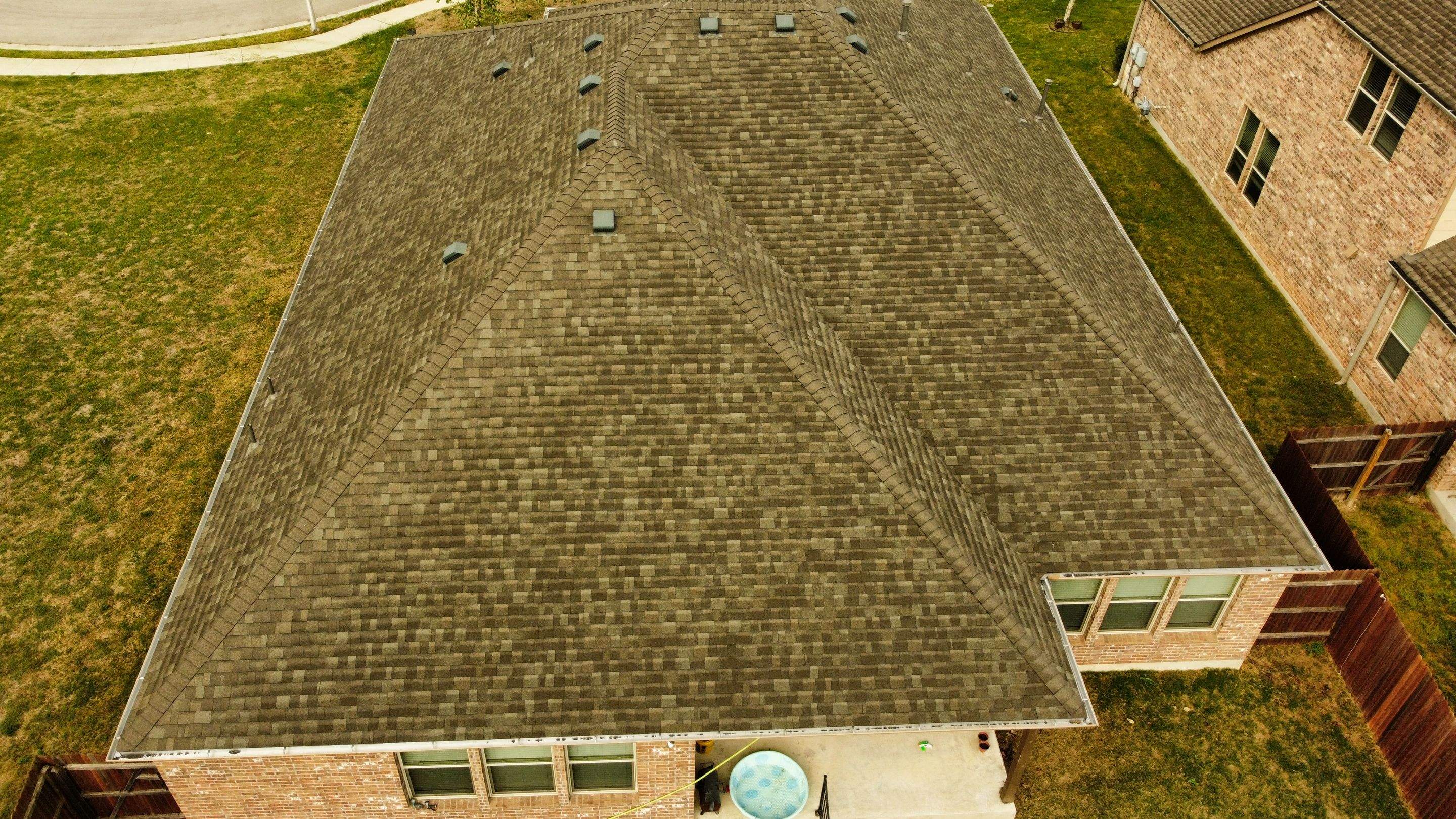 Residential Roof Replacement with Oakridge Asphalt Shingles in Leander by Caliber Restoration LLC