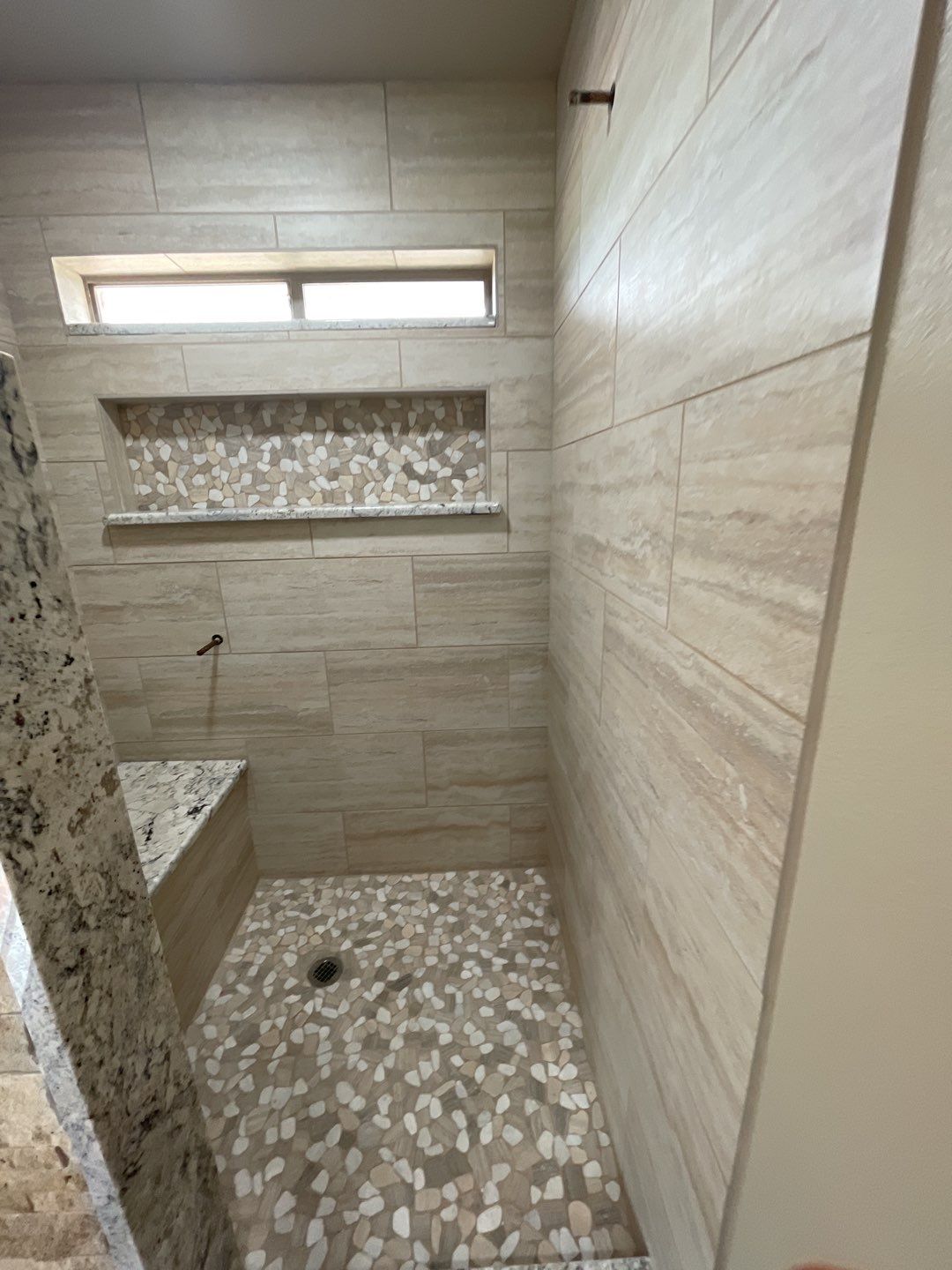 Bathroom Shower Remodel for a client by First United Roofing & Construction