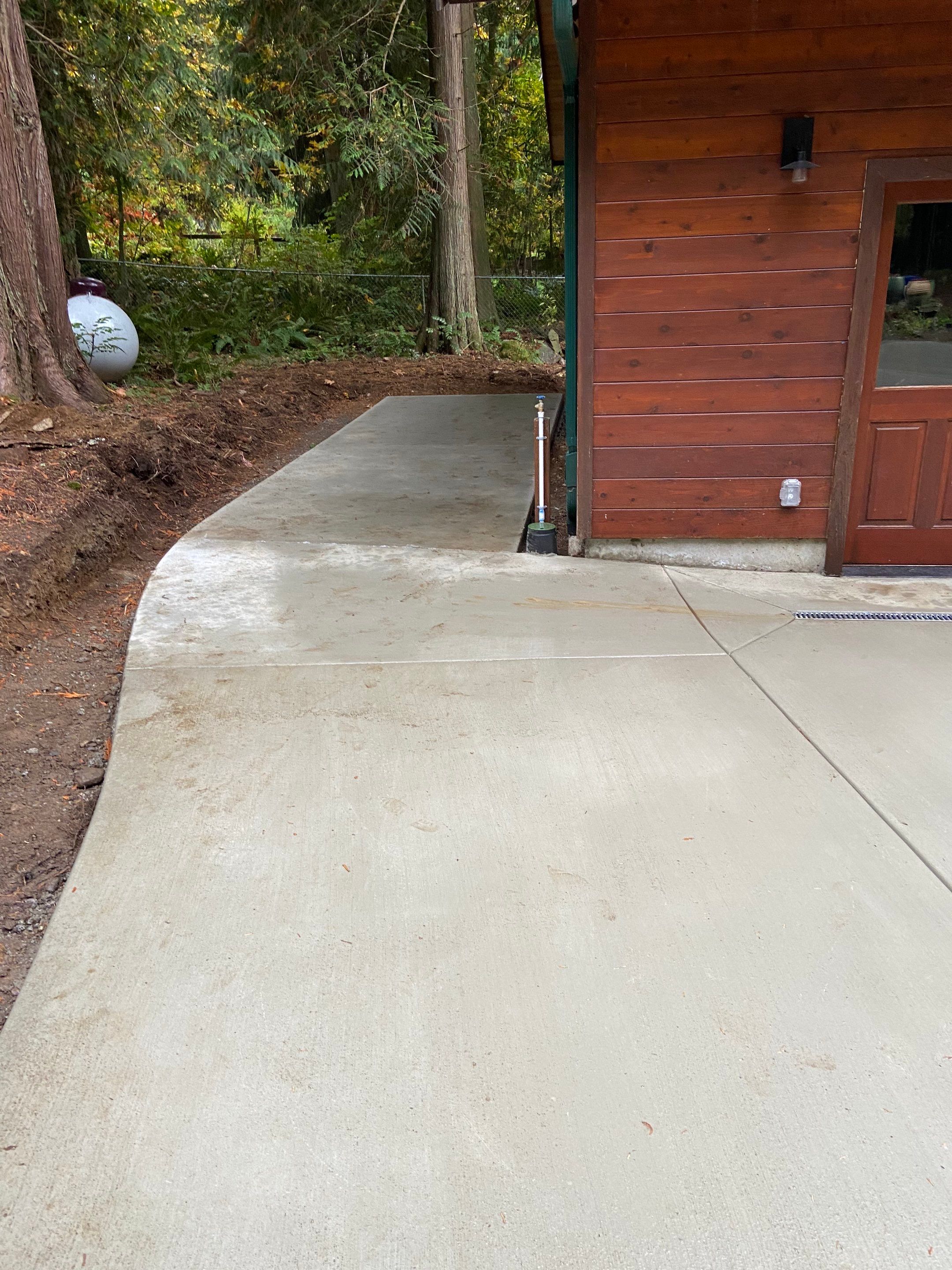 Pia | Custom Concrete Driveway, Walkway & Floating Steps by Jireh Asphalt & Concrete Inc 