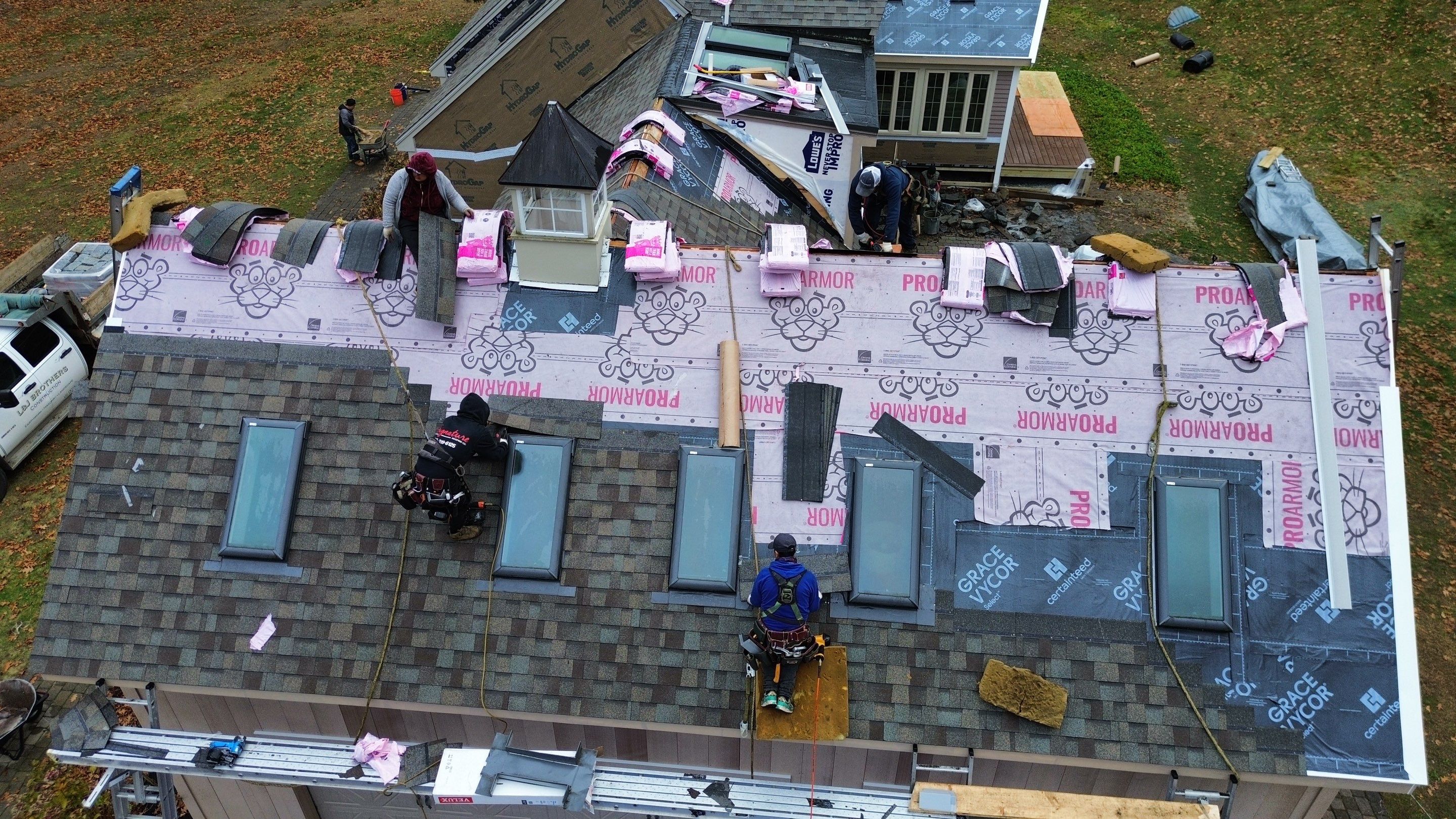 Complete House & Barn Roof with 13 Skylight Reflashing + EPDM Repairs by Mighty Dog Roofing of Greater Middlesex County