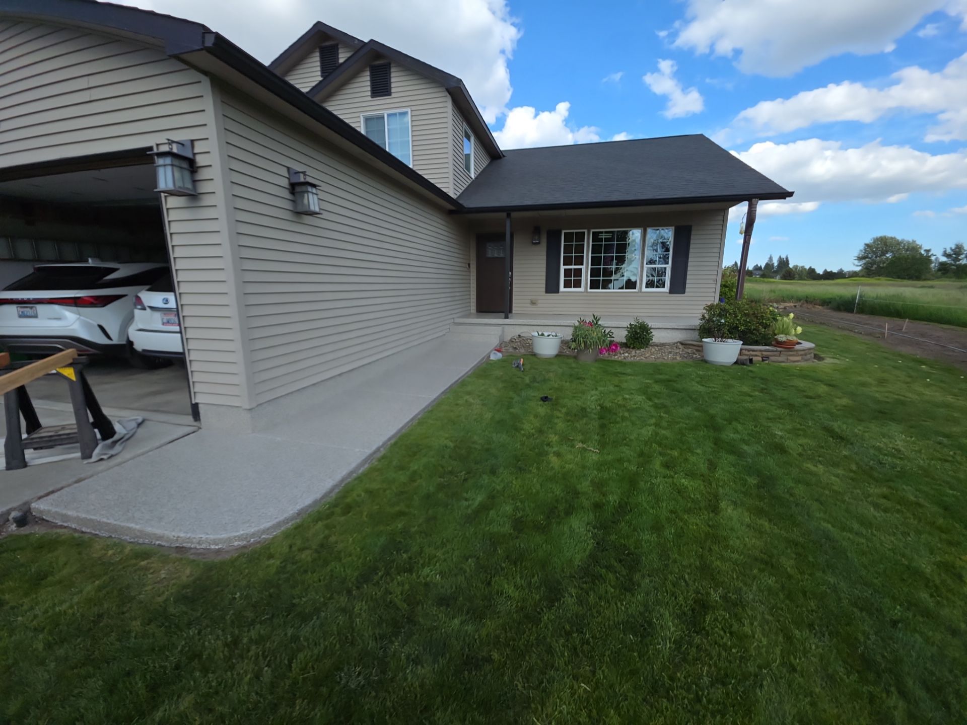 Concrete Patio and Walkway Coating Transformation in Cheney by Croc Coatings, LLC
