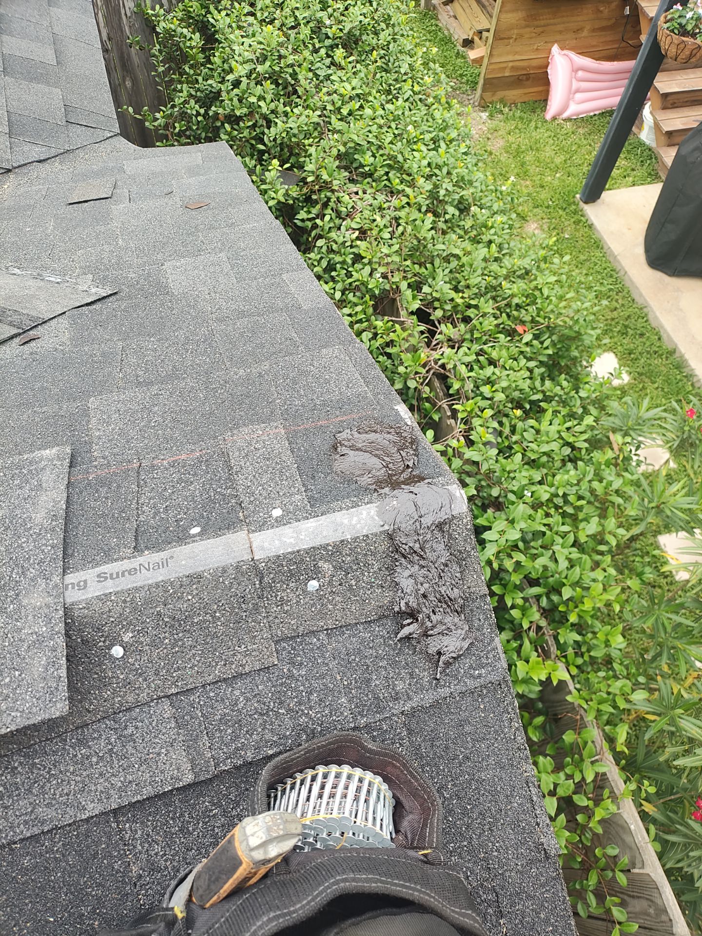 Nothing looks nicer than a little black roof by Bayfront Roofing and Construction