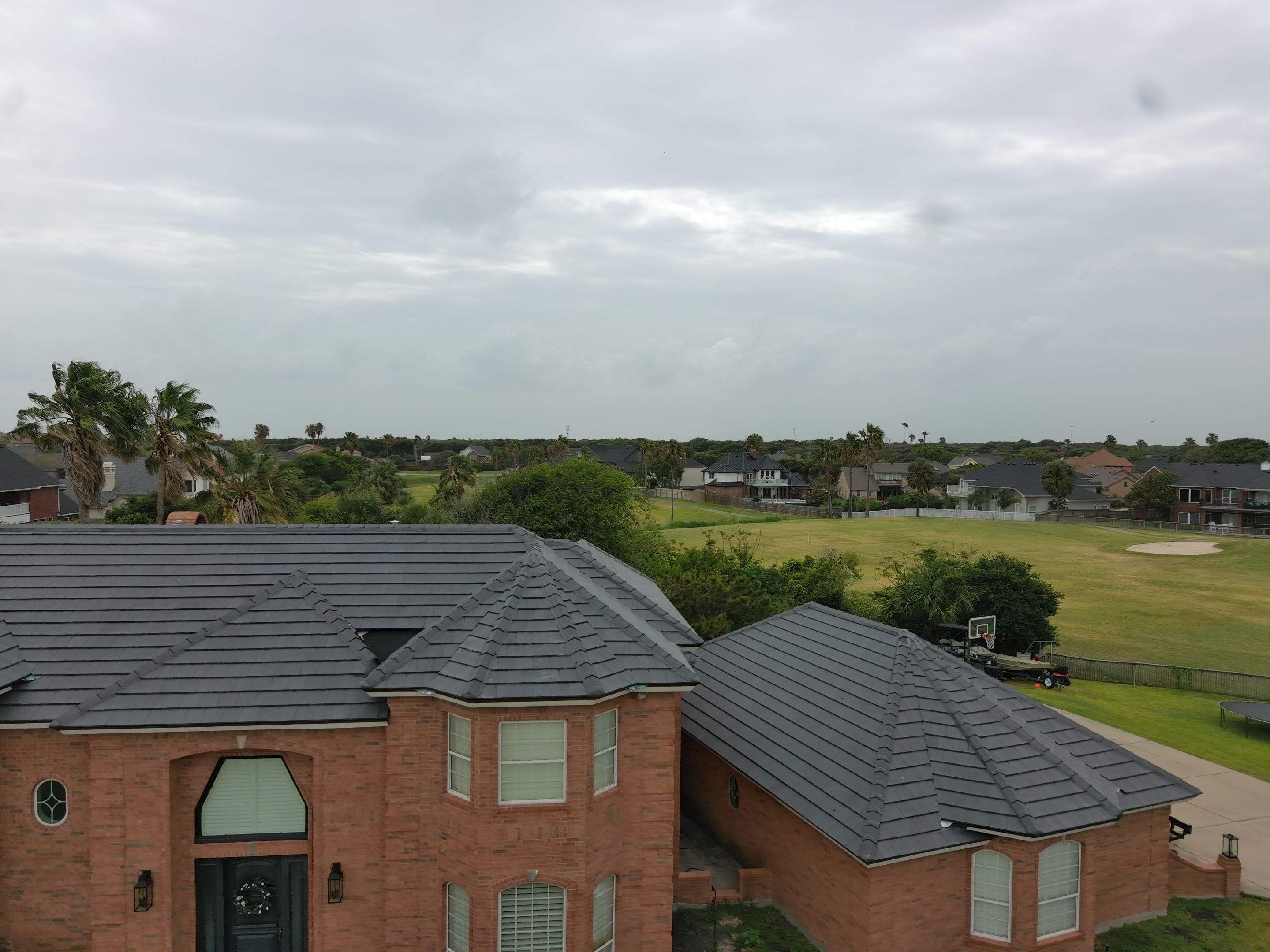 Golf-Proof Tile Roof by Bayfront Roofing and Construction