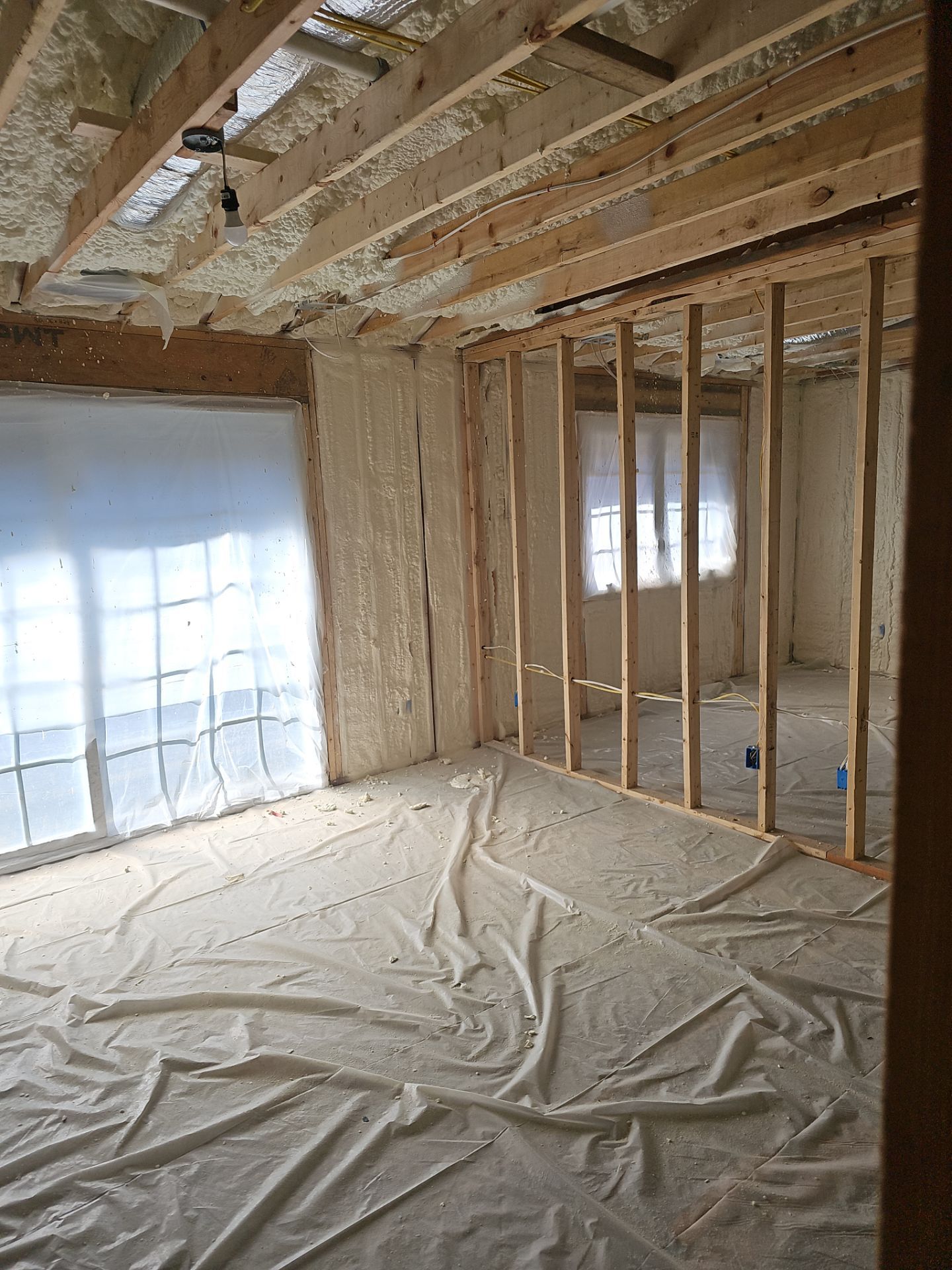 Basement Exterior Walls using Closed Cell Spray Foam by NYS Foam & Energy