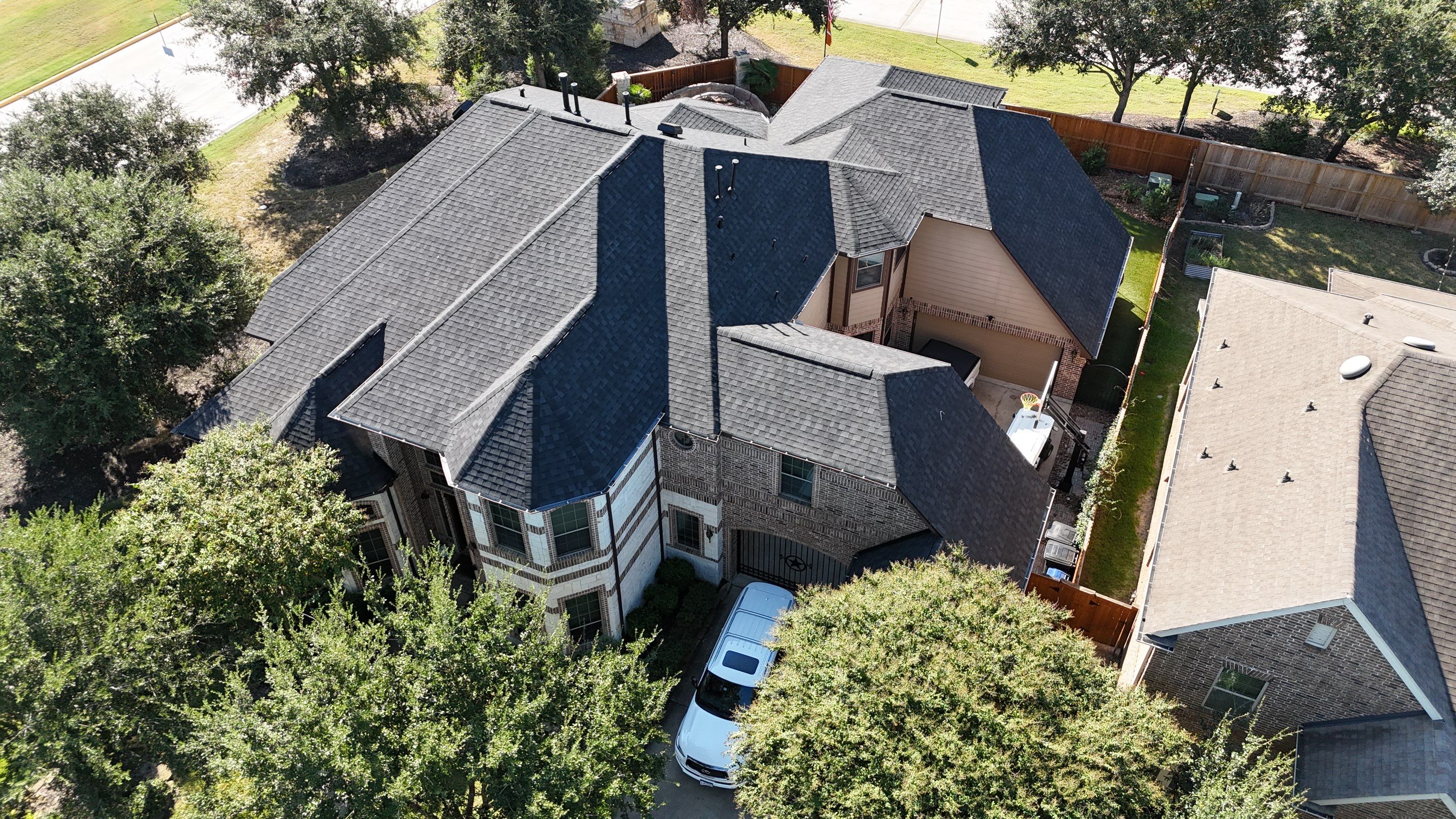 Residential Roofing Installation using IKO Dynasty by Core Four Roofing