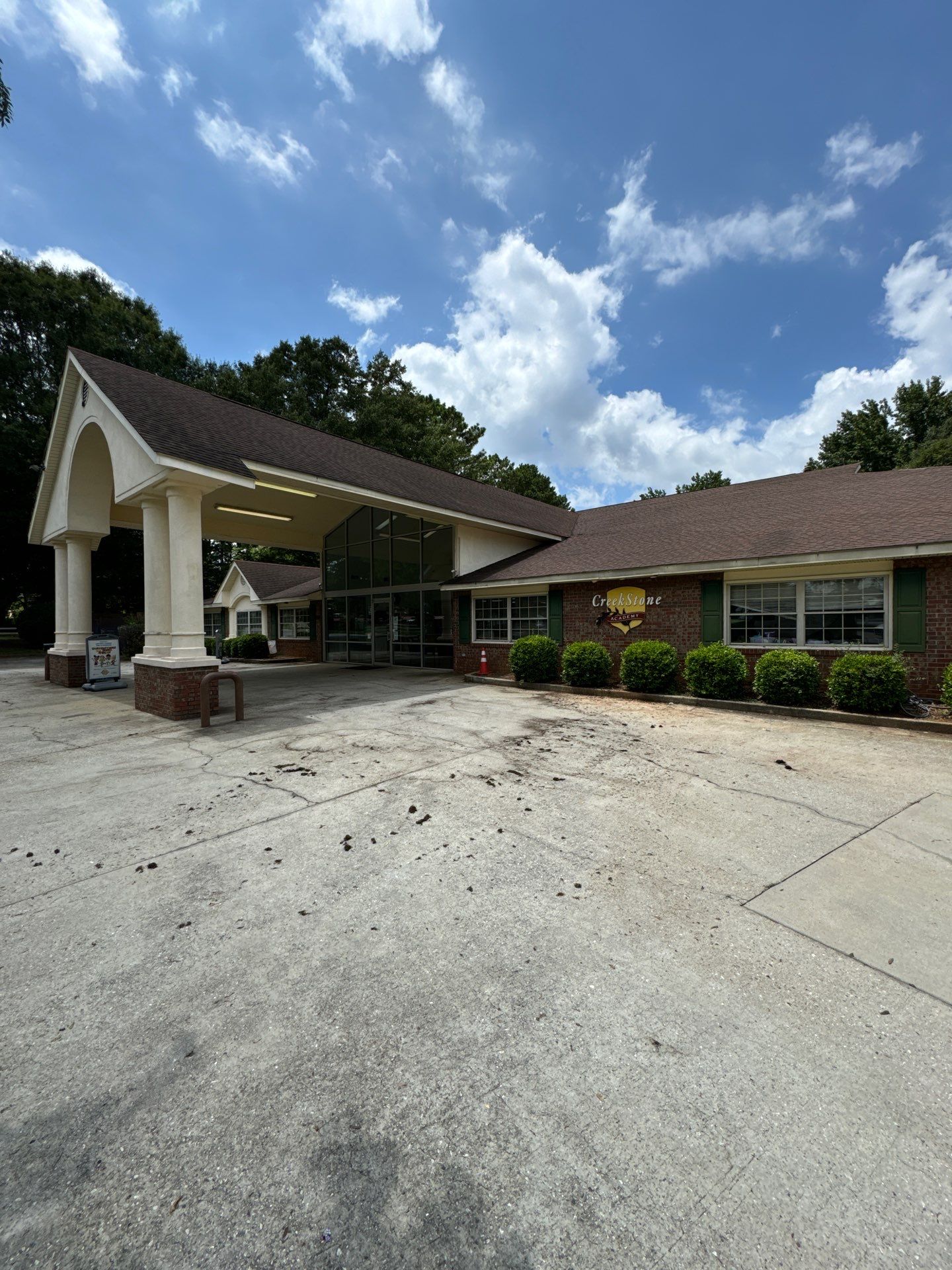 Commercial Exterior Brick and Stucco Painting in Fayetteville by Swift Home Renovations