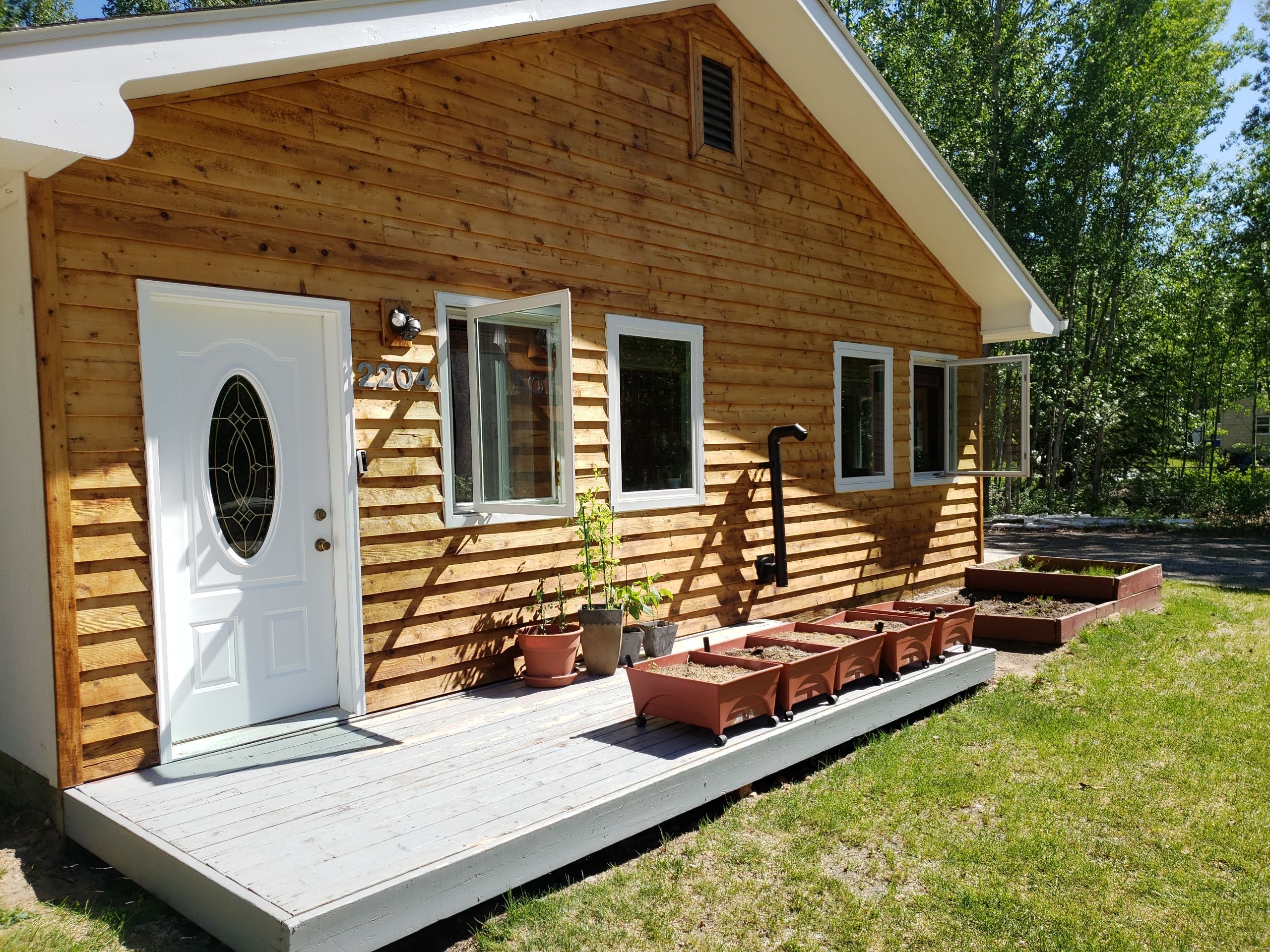 Brightened Cedar Siding & Garage by Midnight Sun Painting