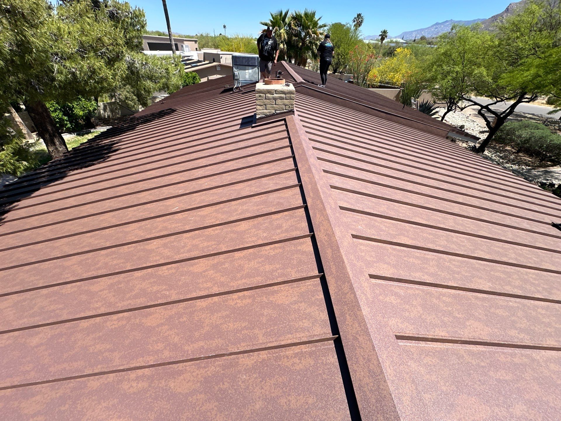 Weathered Rust Standing Seam by Reimagine Roofing