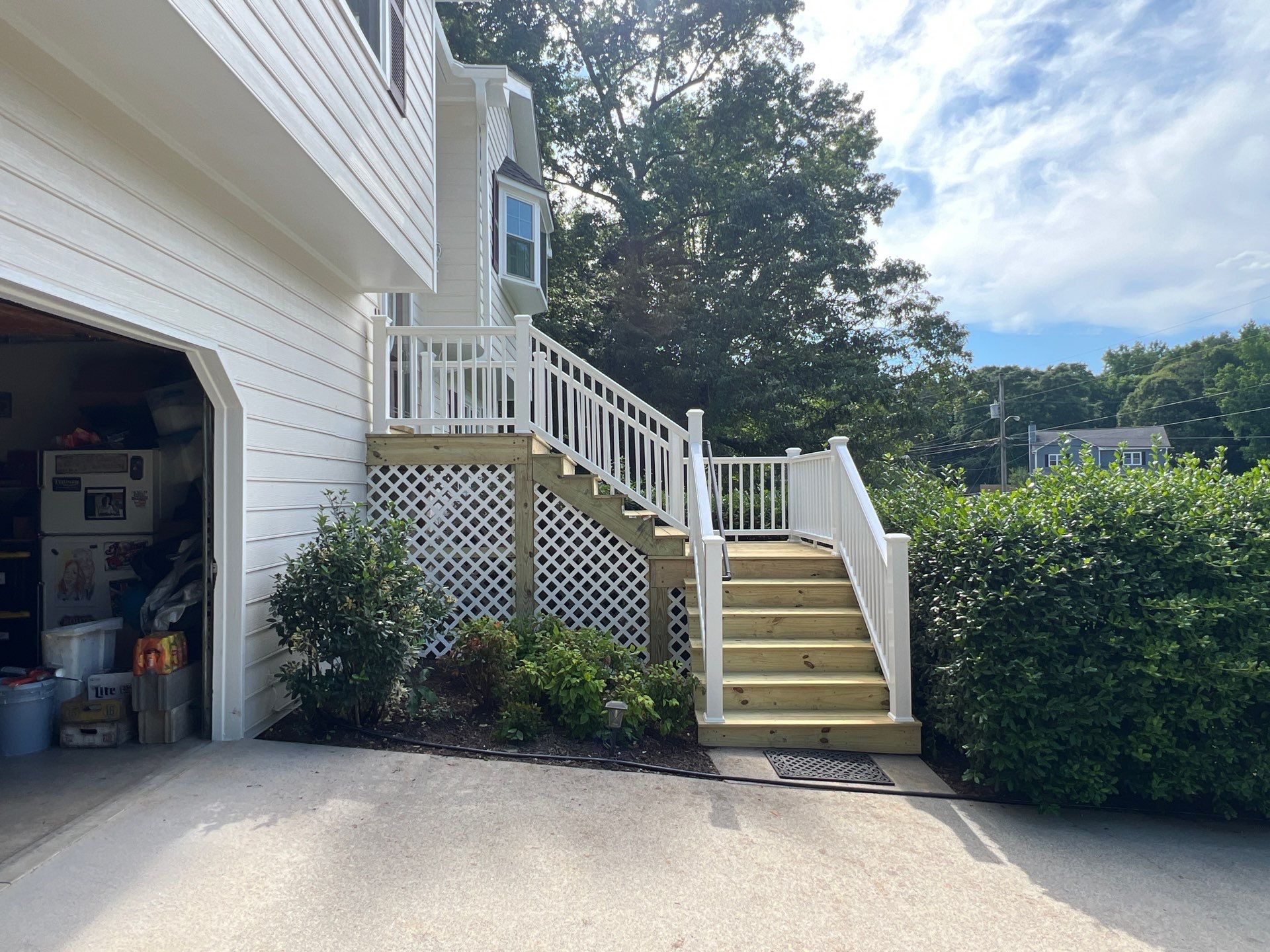 Front Entrance Deck Stair Replacement with White Vinyl Railings in Lawrenceville by Swift Home Renovations