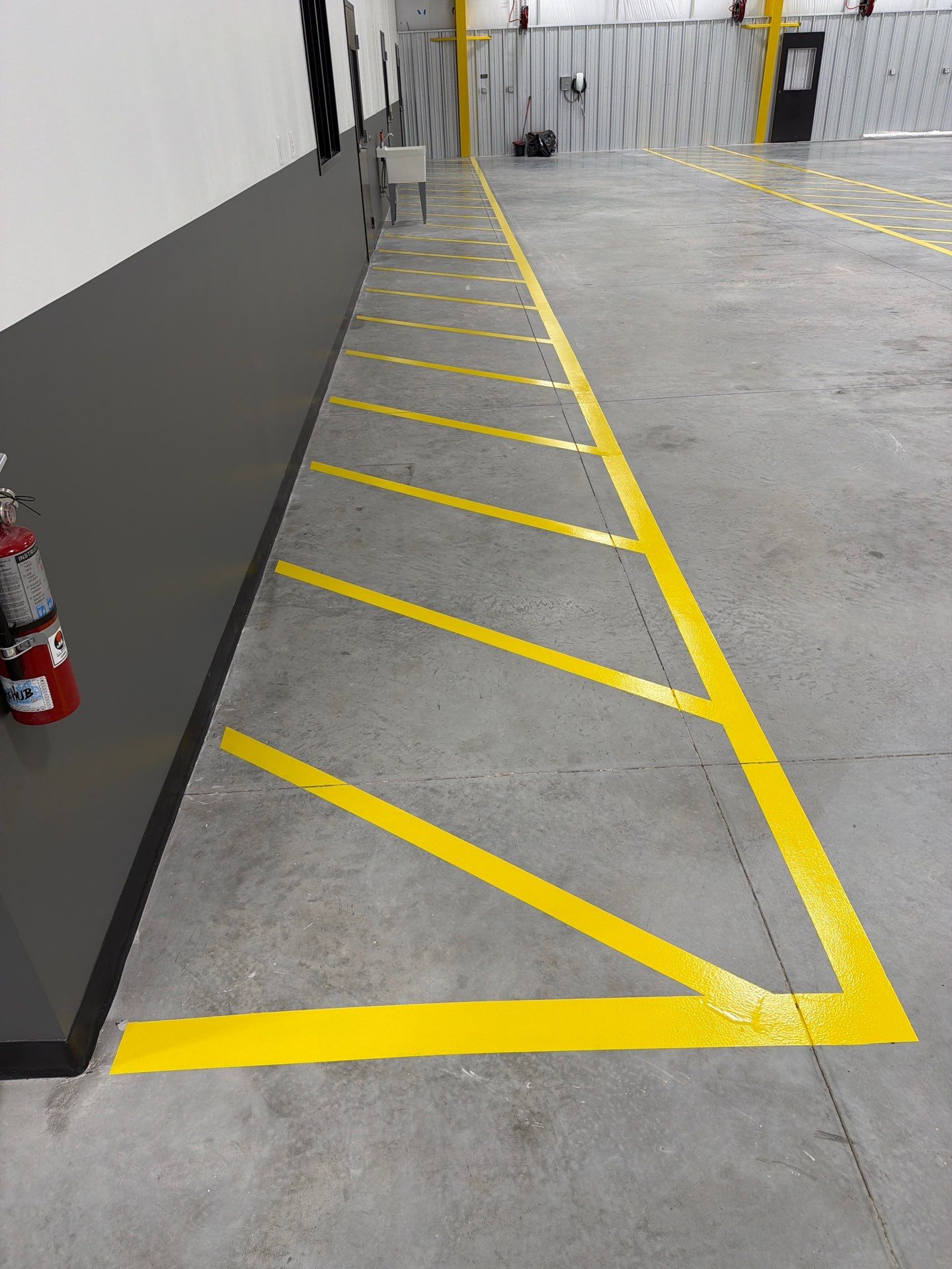 Industrial Epoxy Safety Marking and Hatch Layout in Spring Hill by Everline Coatings & Services - Southwest FL