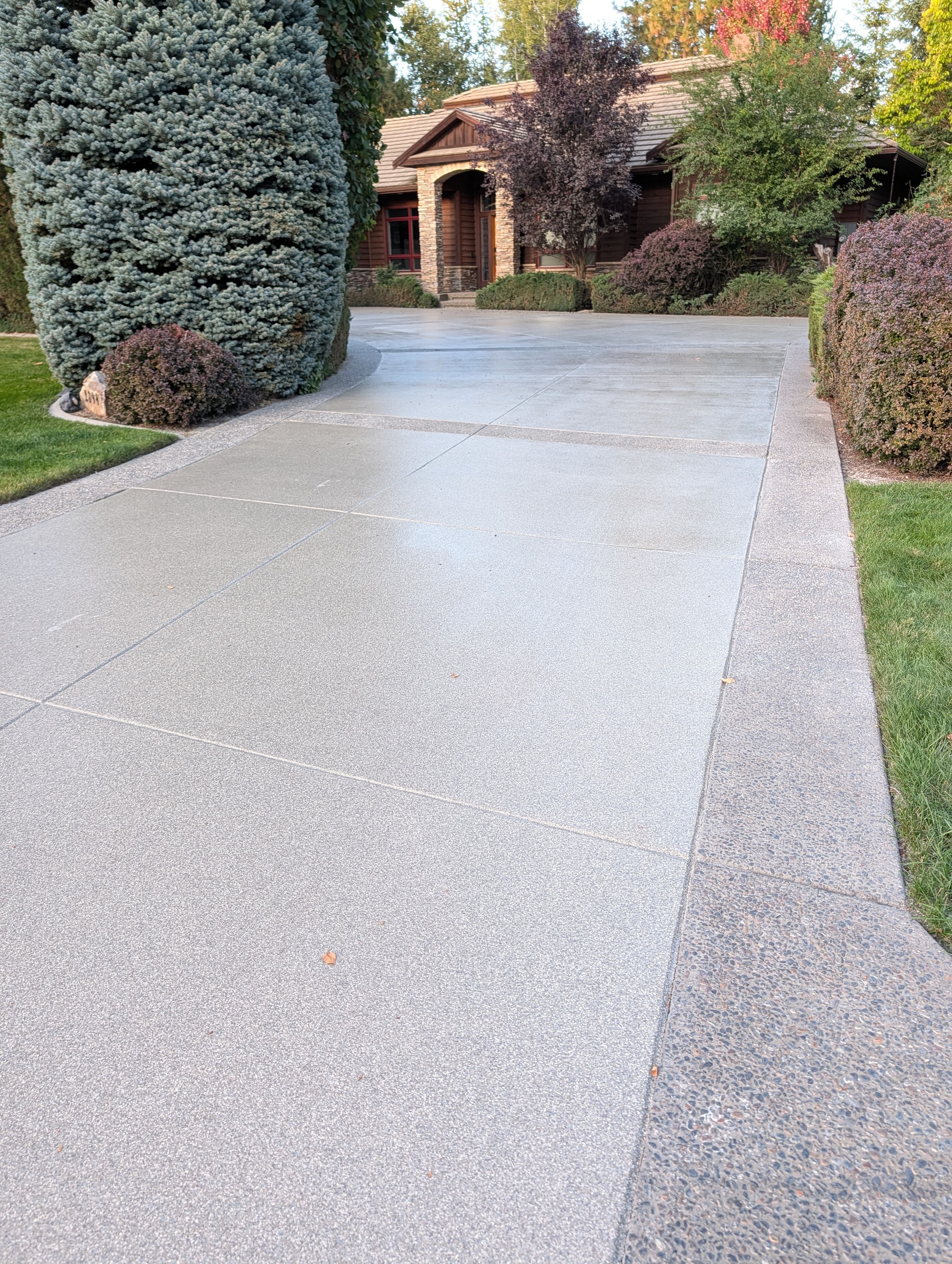 Driveway using Penntek Evolution System and Trail Mix 1/8" Chip by Croc Coatings, LLC