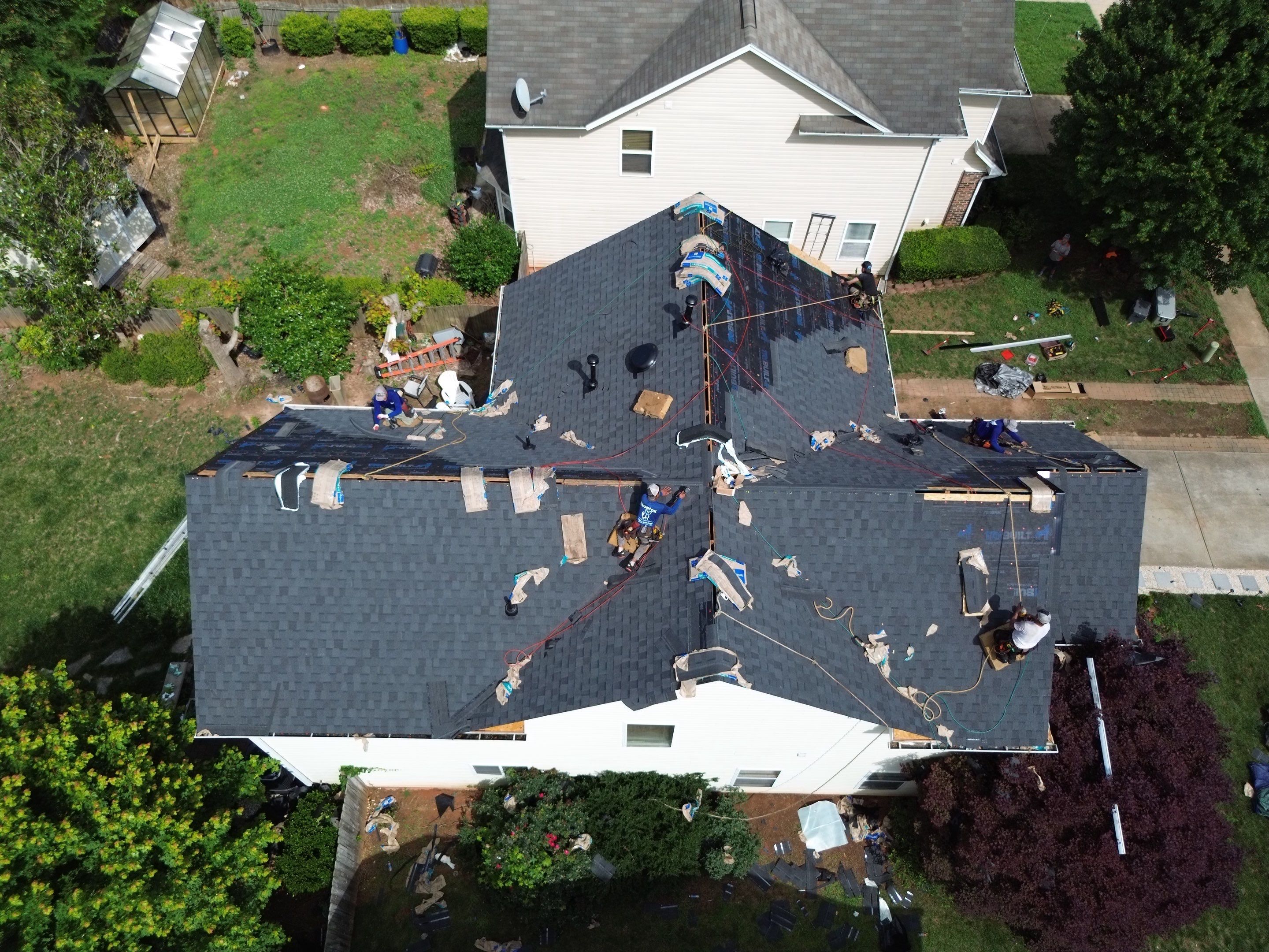 Roof and downspout replacement by hail and wind damage by Just Brilliant Restoration JBR