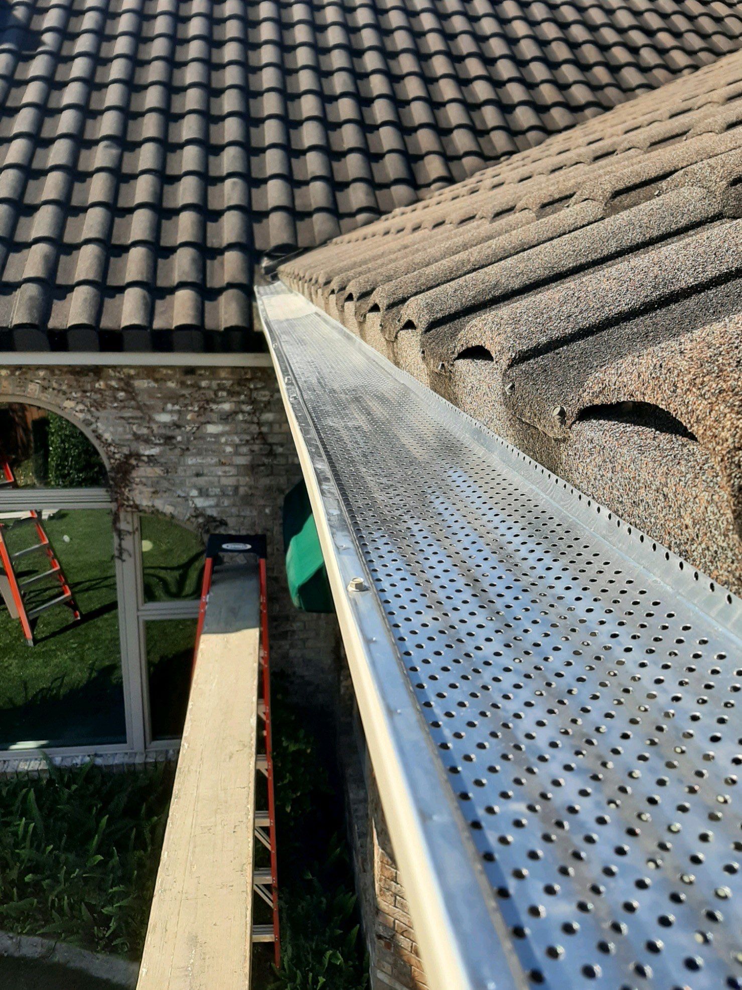 Seamless Gutter Installation with Wicker Color K-Style Gutters and LeafBlaster Pro Mesh Gutter Guards by Gutter Professors
