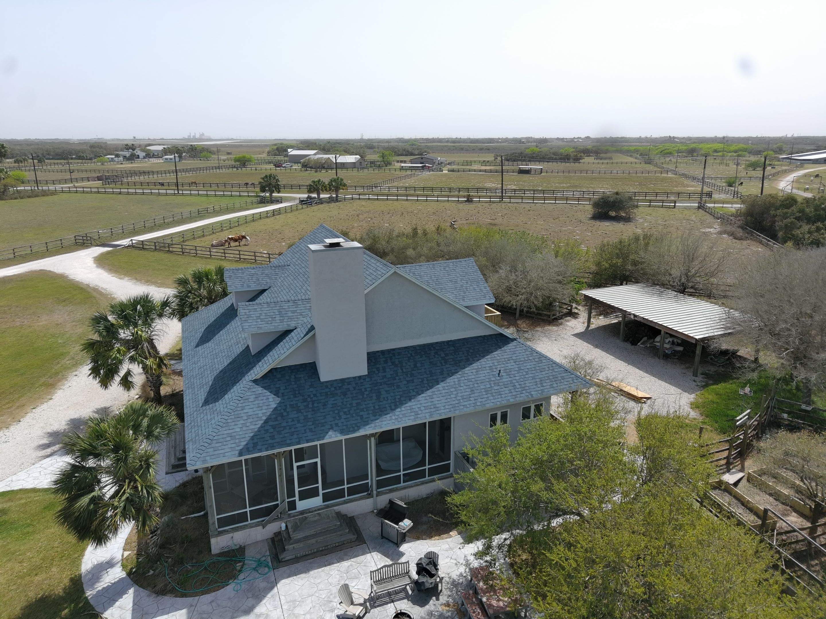 Long Horn Retreat by Bayfront Roofing and Construction