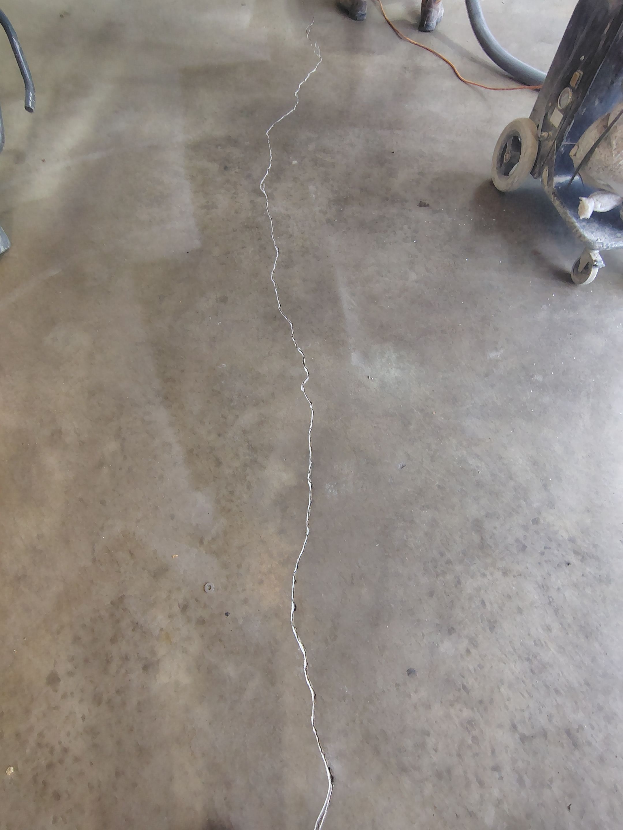 Sioux Falls Garage Concrete Grinding and Nightfall Decorative Chip Coating by Select Painting, Coatings & Garage Cabinets