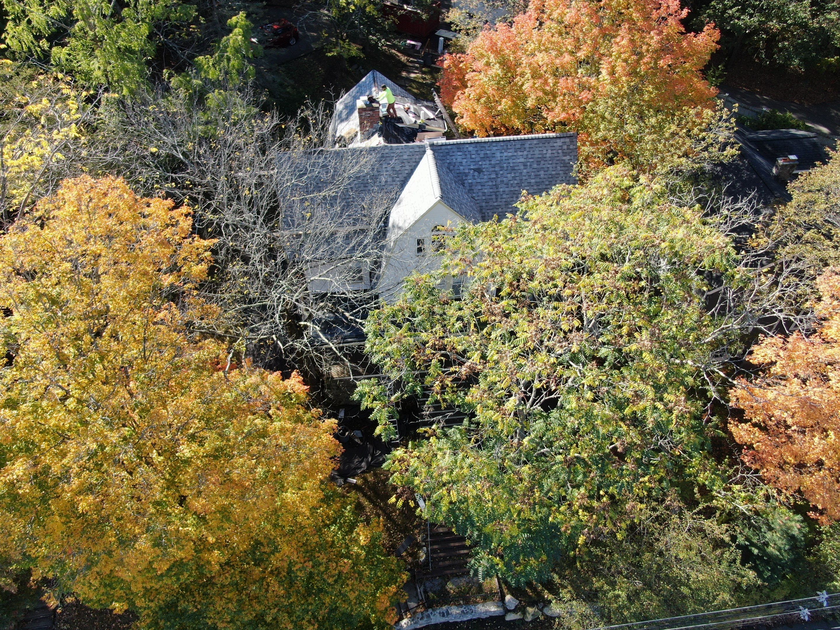 Full Roof & Porch EPDM Replacement with Skylight and Chimney Repairs by Mighty Dog Roofing of Greater Middlesex County