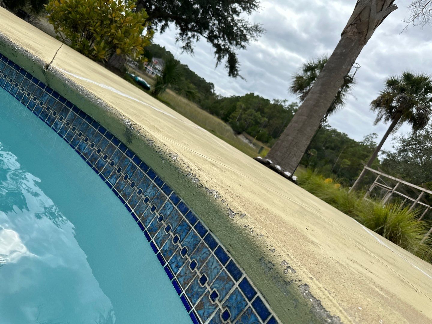Concrete Pool deck with AcryFin by DuraSeal