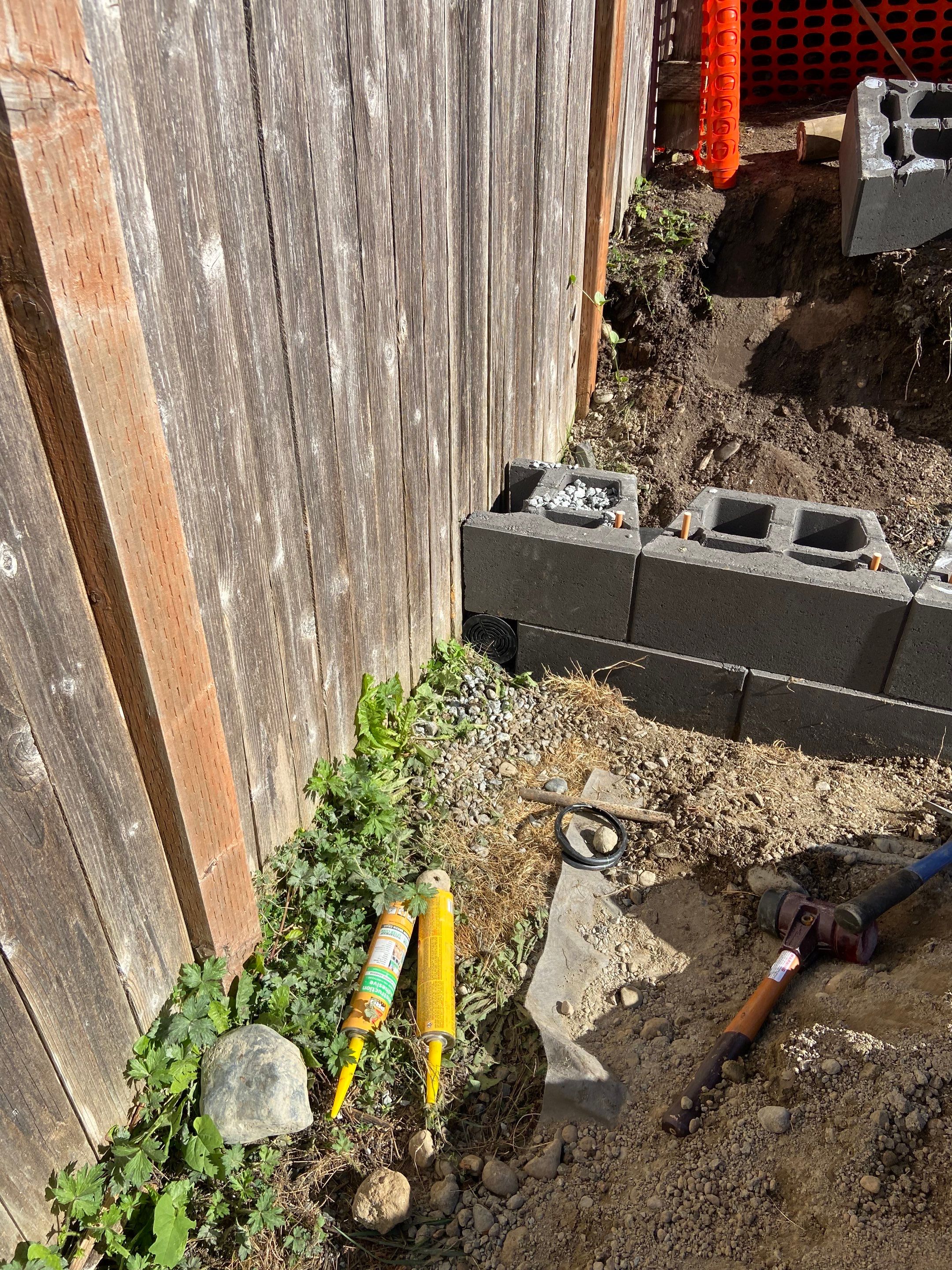 Jireh Outdoor Projects | Retaining Wall & Fence Build by Jireh Asphalt & Concrete Inc 