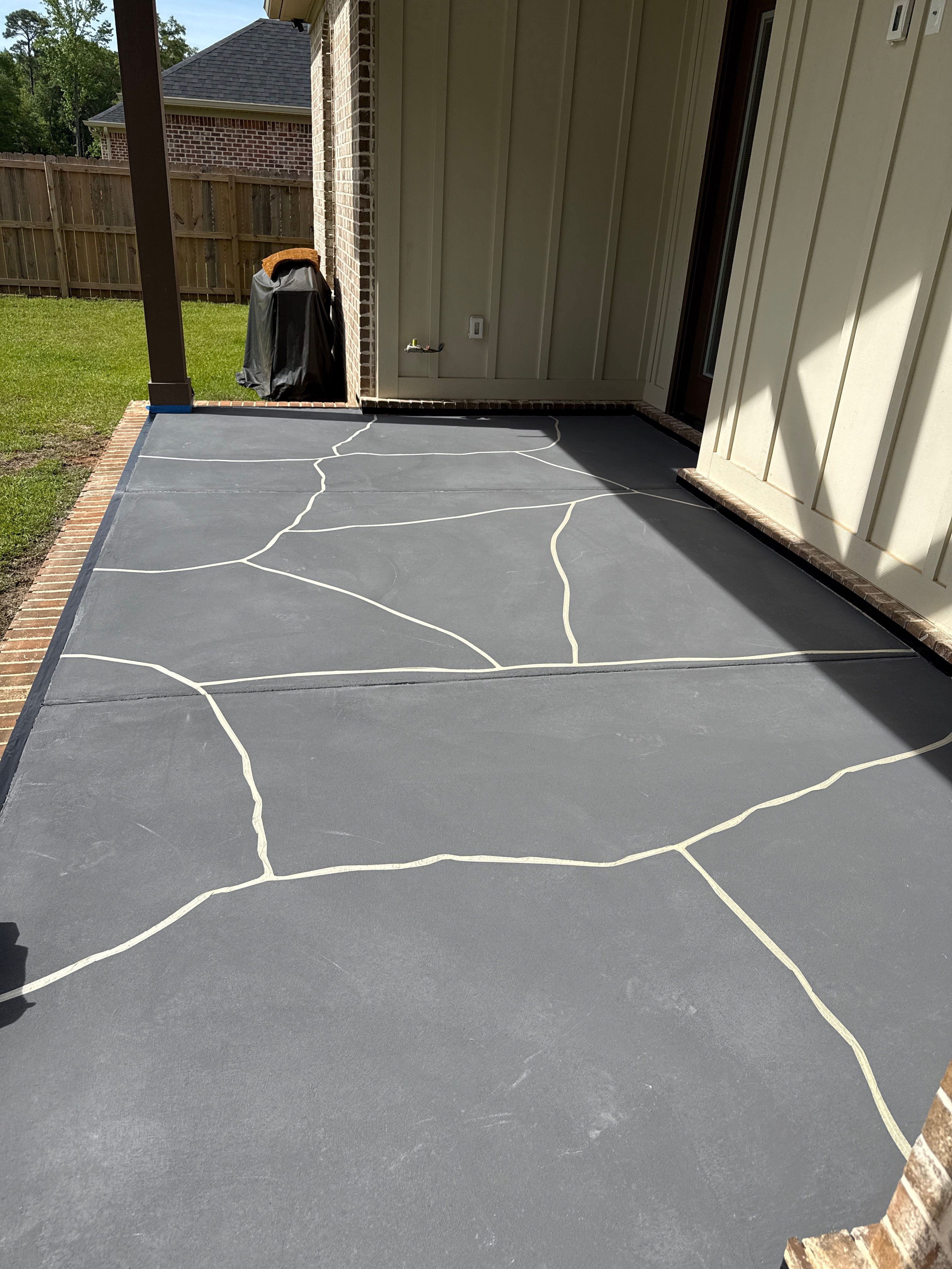 Decorative Stained Concrete Overlay and Garage Floor Coating in Mobile by Cornerstone Hard Surface Restoration 