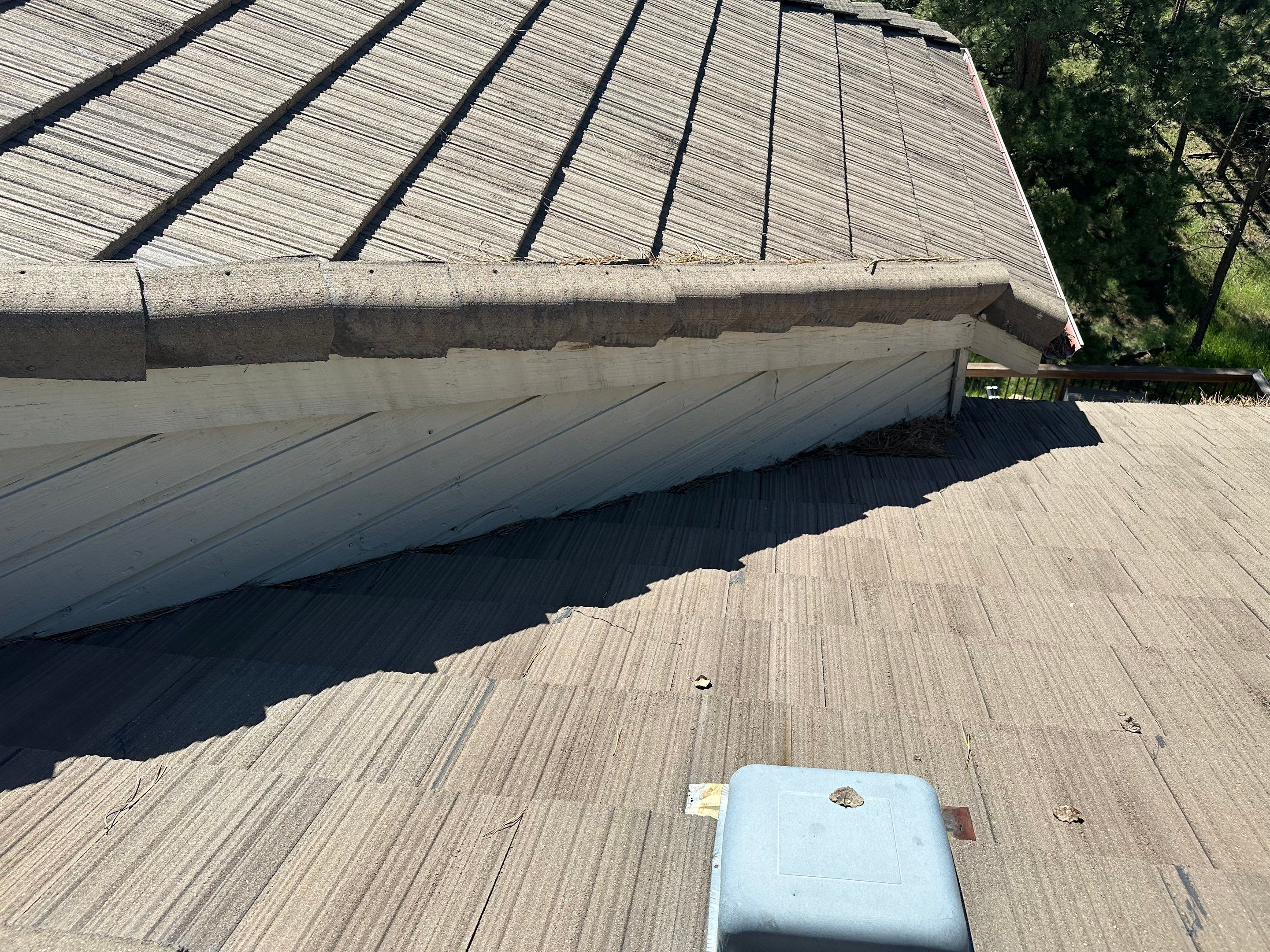 Residential Roofing Installation using Concrete Tile by Blue Peaks Roofing LLC 
