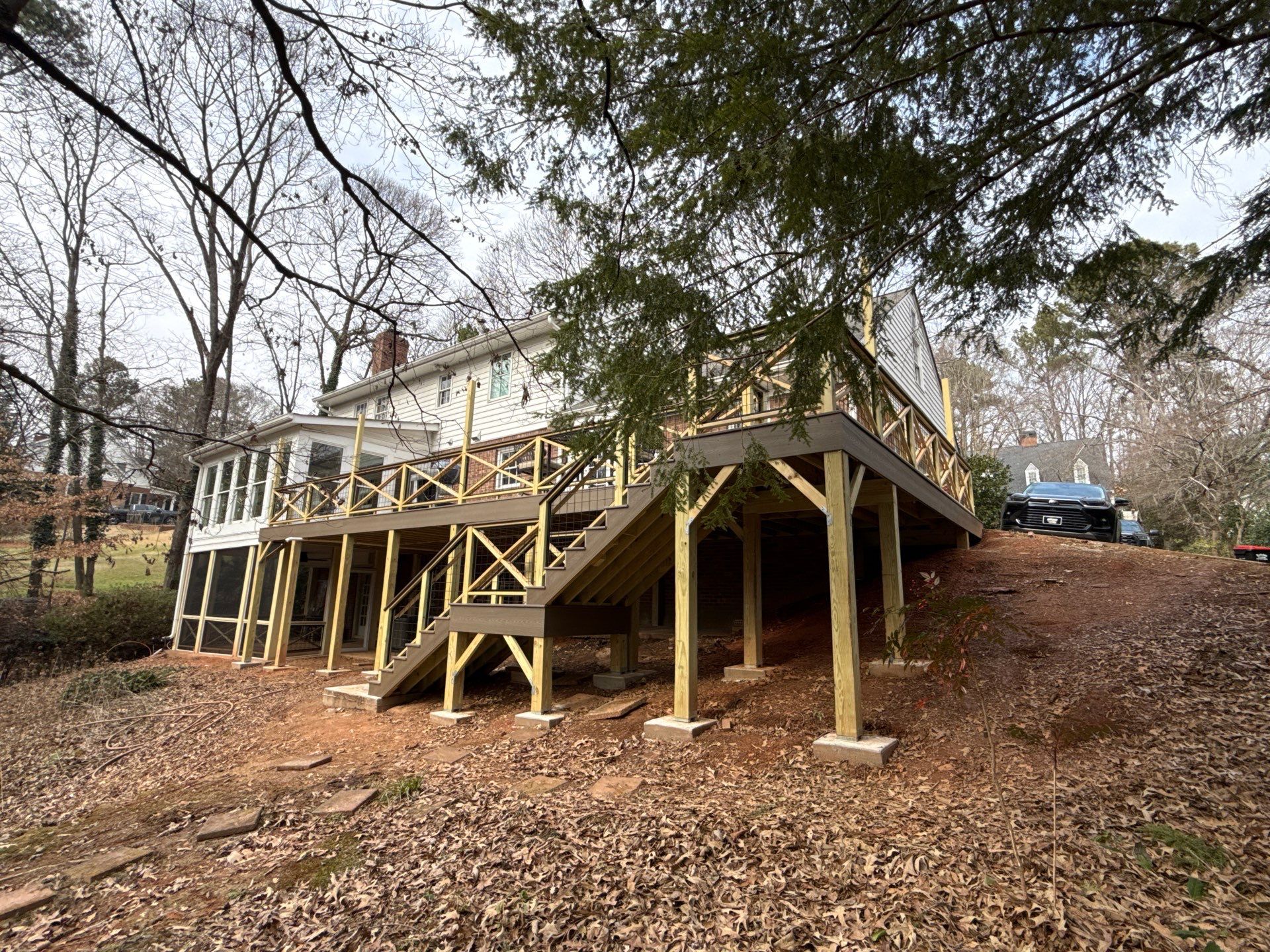 Deck Build and Screened-In Porch Install with Wild Hog 6' Black Mesh Panel Railing by Nelson Exteriors