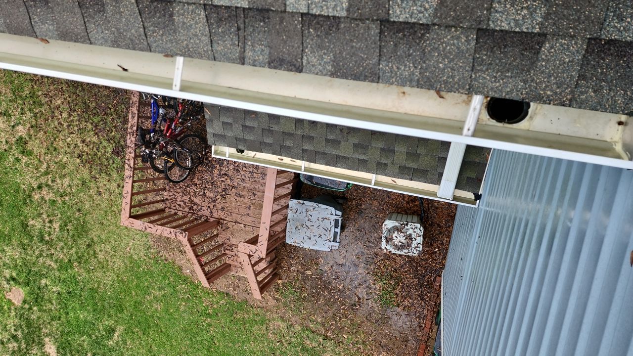 Gutter Cleaning using water by Power Wash Masters LLC