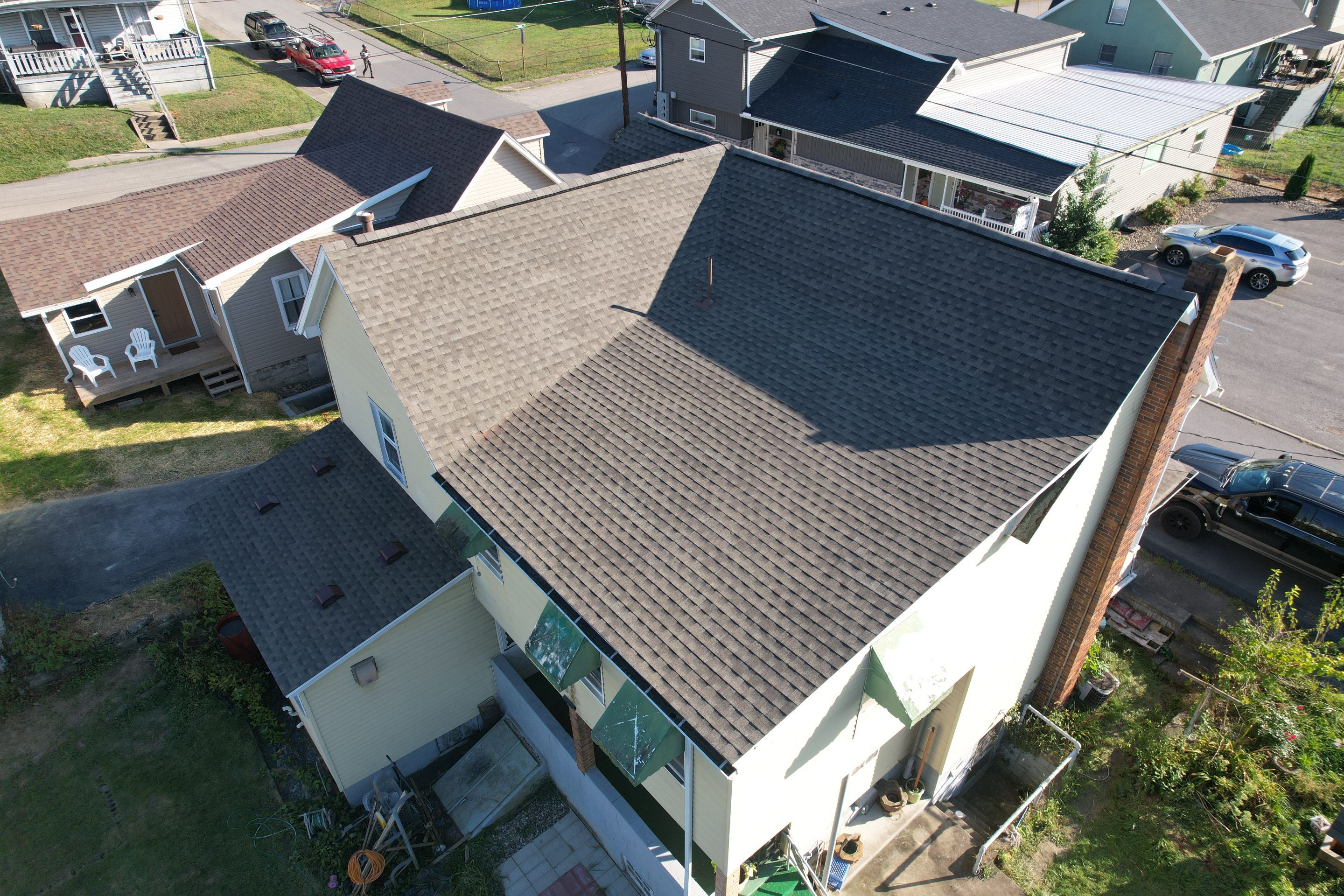 Residential Roofing Installation using GAF Timberline HDZ Weatherer Wood by Rainstoppers Roofing