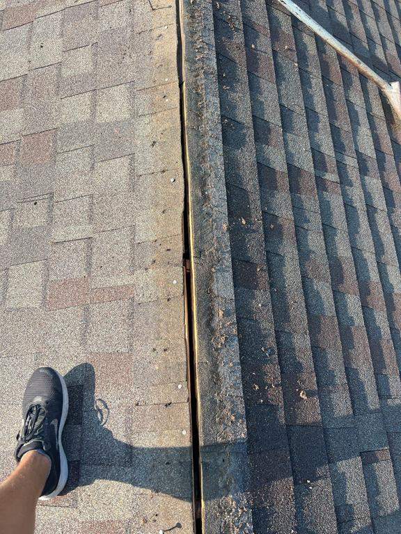 Residential Roofing Repair using Ridge vent replacement by Nitro Roofing and Construction