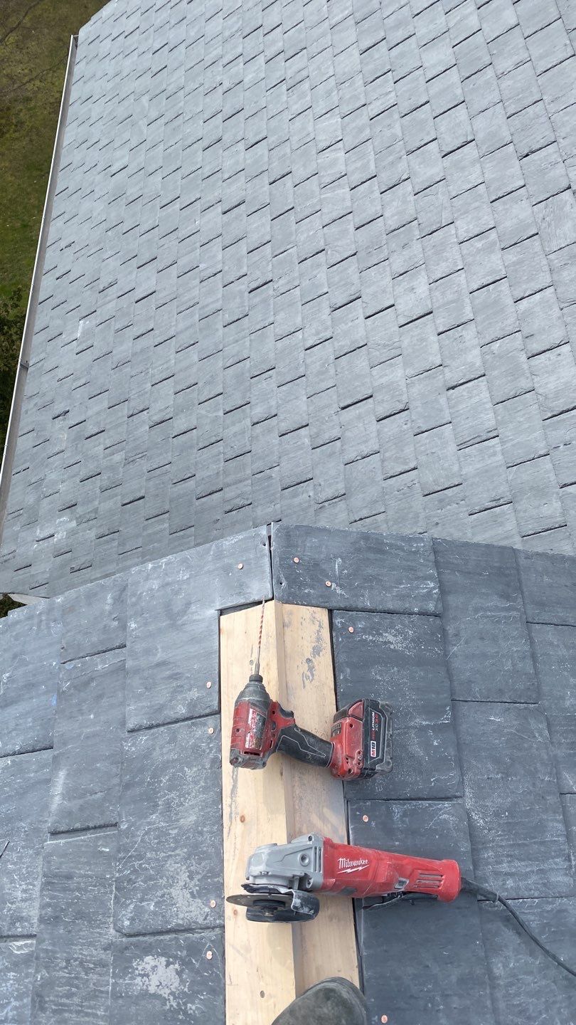 Residential Roofing Installation using Vermont Slate by A Plus Exterior