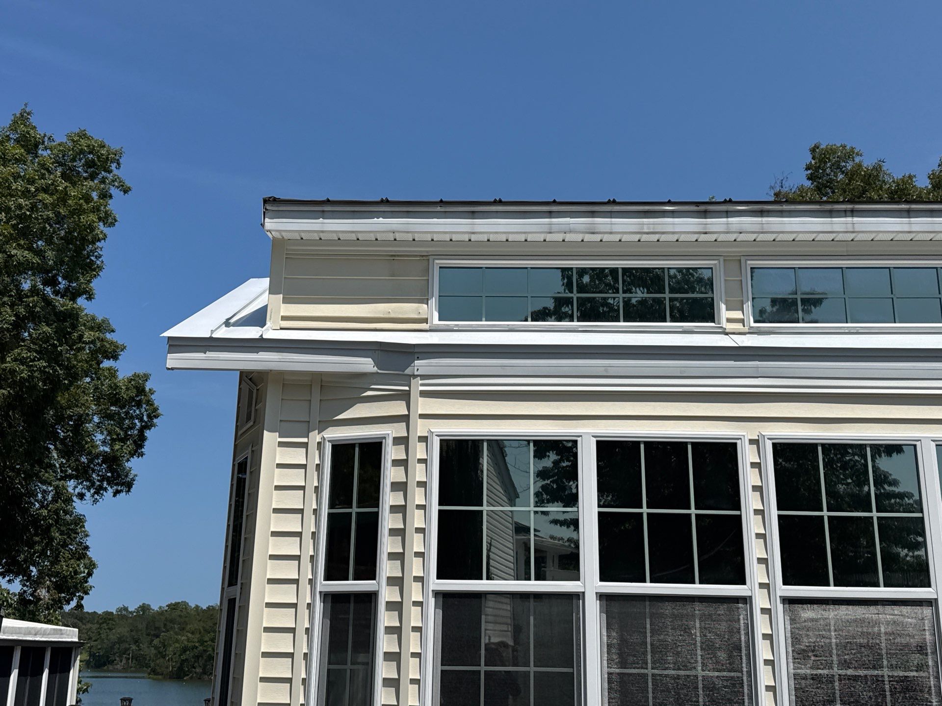 White Standing Seam Metal Roof Installation in Wake, VA by Cade Construction