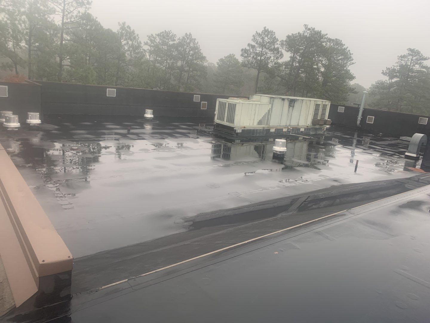 Re Roof (TPO) by American Roofing NC