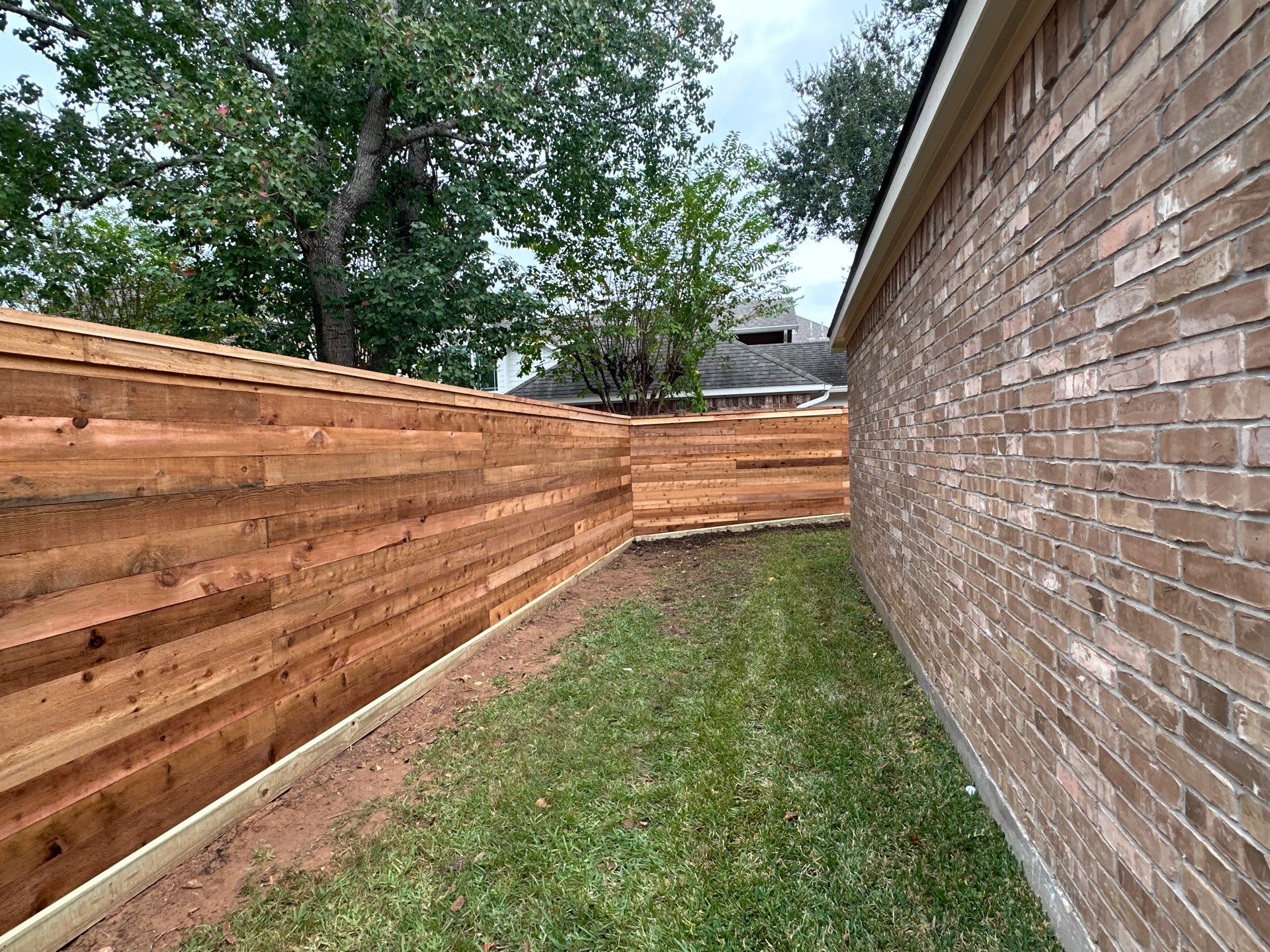 Fence Installation using Premium horizontal WRC by Tim's Fences